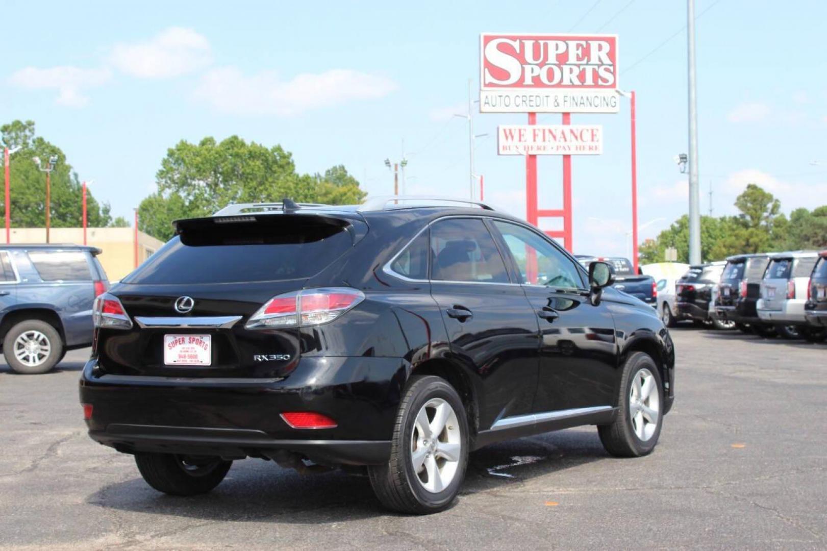 2015 Black Lexus RX 350 AWD (2T2BK1BA0FC) with an 3.5L V6 DOHC 24V engine, 6-Speed Automatic transmission, located at 4301 NW 39th , Oklahoma City, OK, 73112, (405) 949-5600, 35.512135, -97.598671 - NO DRIVERS LICENCE NO-FULL COVERAGE INSURANCE-NO CREDIT CHECK. COME ON OVER TO SUPERSPORTS AND TAKE A LOOK AND TEST DRIVE. PLEASE GIVE US A CALL AT (405) 949-5600. NO LICENCIA DE MANEJAR- NO SEGURO DE COBERTURA TOTAL- NO VERIFICACCION DE CREDITO. POR FAVOR VENGAN A SUPERSPORTS, ECHE UN VI - Photo#4