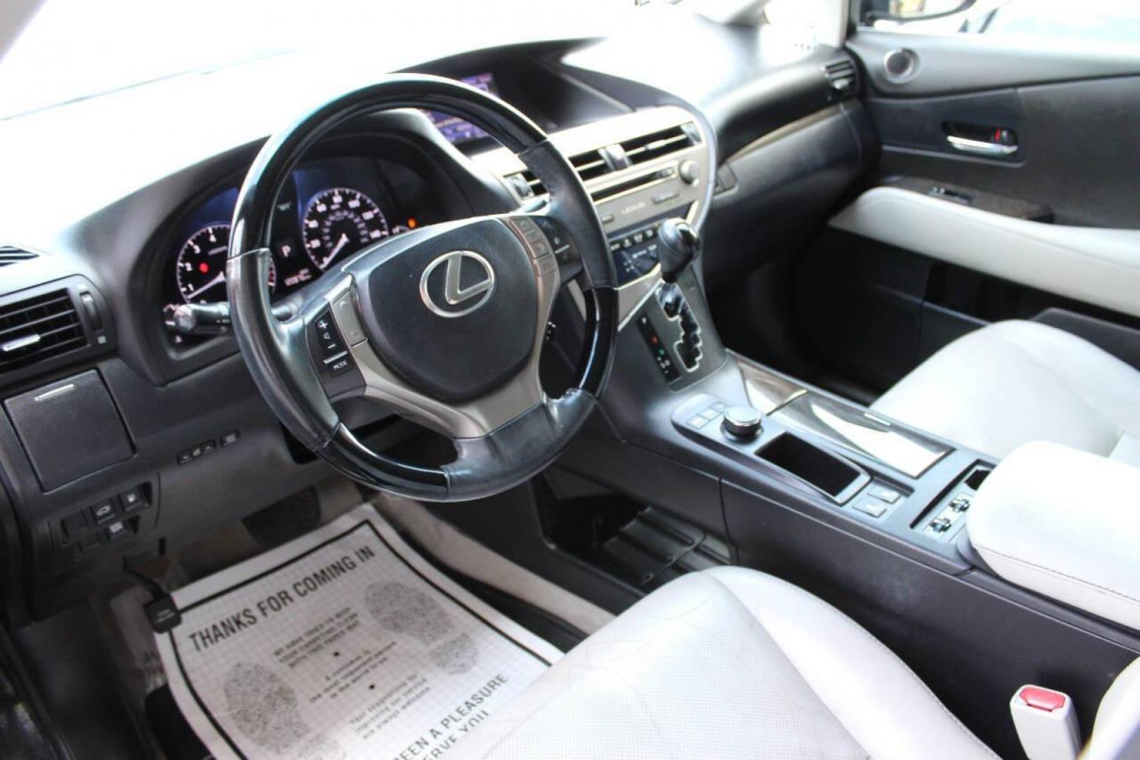 2015 Black Lexus RX 350 AWD (2T2BK1BA0FC) with an 3.5L V6 DOHC 24V engine, 6-Speed Automatic transmission, located at 4301 NW 39th , Oklahoma City, OK, 73112, (405) 949-5600, 35.512135, -97.598671 - NO DRIVERS LICENCE NO-FULL COVERAGE INSURANCE-NO CREDIT CHECK. COME ON OVER TO SUPERSPORTS AND TAKE A LOOK AND TEST DRIVE. PLEASE GIVE US A CALL AT (405) 949-5600. NO LICENCIA DE MANEJAR- NO SEGURO DE COBERTURA TOTAL- NO VERIFICACCION DE CREDITO. POR FAVOR VENGAN A SUPERSPORTS, ECHE UN VI - Photo#16