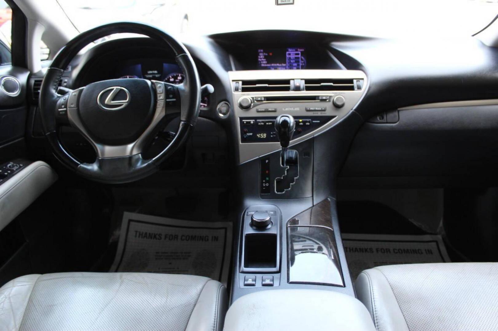 2015 Black Lexus RX 350 AWD (2T2BK1BA0FC) with an 3.5L V6 DOHC 24V engine, 6-Speed Automatic transmission, located at 4301 NW 39th , Oklahoma City, OK, 73112, (405) 949-5600, 35.512135, -97.598671 - NO DRIVERS LICENCE NO-FULL COVERAGE INSURANCE-NO CREDIT CHECK. COME ON OVER TO SUPERSPORTS AND TAKE A LOOK AND TEST DRIVE. PLEASE GIVE US A CALL AT (405) 949-5600. NO LICENCIA DE MANEJAR- NO SEGURO DE COBERTURA TOTAL- NO VERIFICACCION DE CREDITO. POR FAVOR VENGAN A SUPERSPORTS, ECHE UN VI - Photo#18
