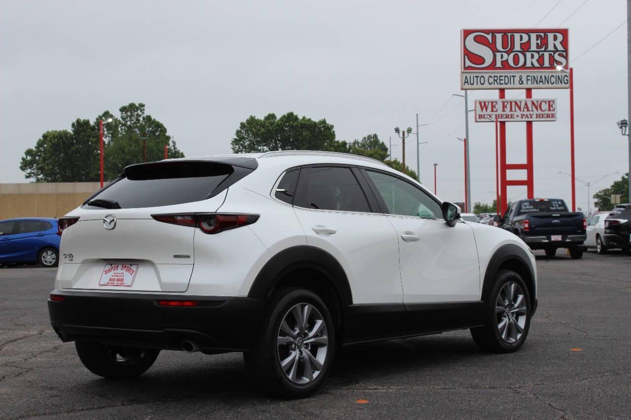 2023 White Mazda CX-30 Preferred AWD (3MVDMBCM1PM) with an 2.5L L4 DOHC 16V engine, 6A transmission, located at 4301 NW 39th , Oklahoma City, OK, 73112, (405) 949-5600, 35.512135, -97.598671 - NO DRIVERS LICENCE -NO FULL COVERAGE INSURANCE - NO CREDIT CHECK. COME ON OVER TO SUPERSPORTS, TAKE A LOOK AND TEST DRIVE. PLEASE GIVE US A CALL AT (405) 949-5600. NO LICENCIA DE CONDUCIR - NO SEGURO DE COBERTURA TOTAL - NO VERIFICACION DE CREDITO. VISITENOS EN SUPERSPORTS, MIRE NUESTRO - Photo#3