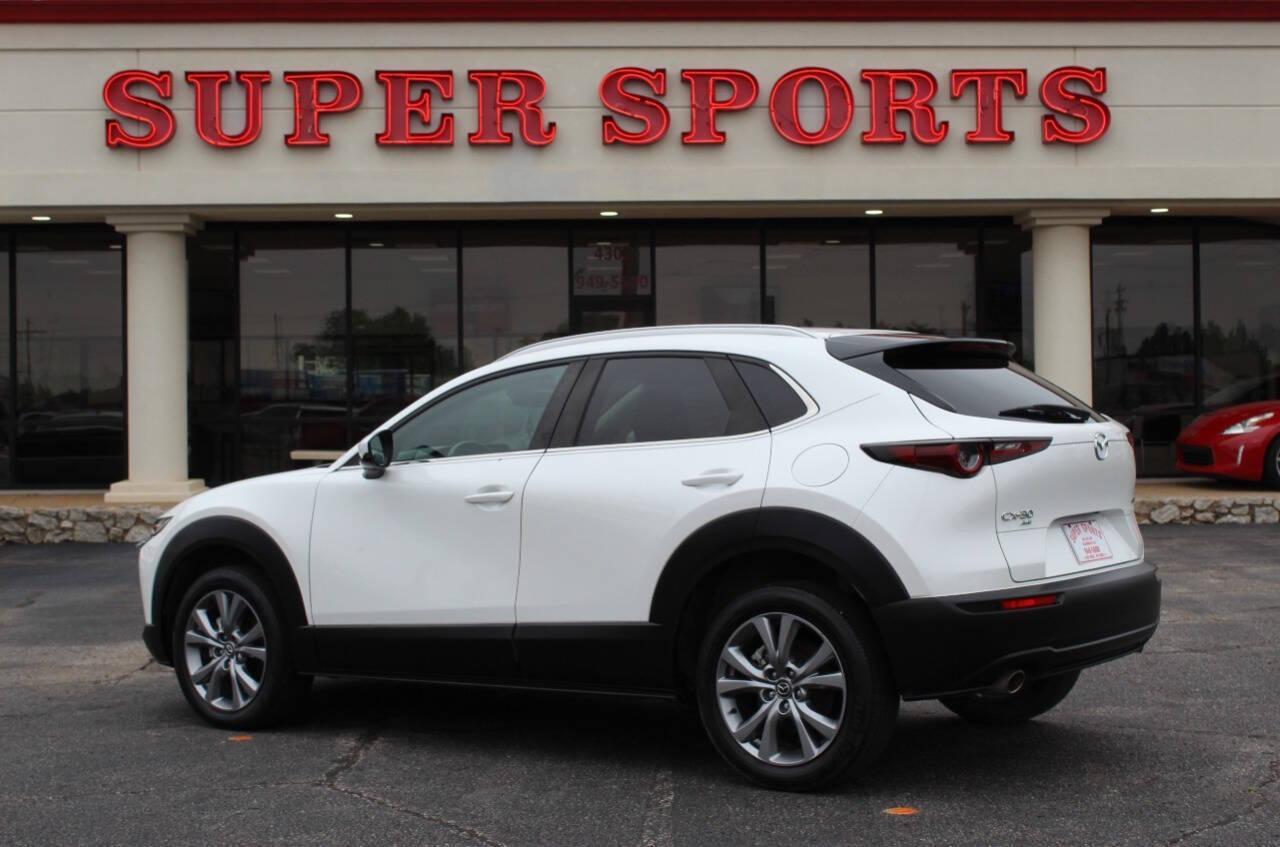 2023 White Mazda CX-30 Preferred AWD (3MVDMBCM1PM) with an 2.5L L4 DOHC 16V engine, 6A transmission, located at 4301 NW 39th , Oklahoma City, OK, 73112, (405) 949-5600, 35.512135, -97.598671 - NO DRIVERS LICENCE -NO FULL COVERAGE INSURANCE - NO CREDIT CHECK. COME ON OVER TO SUPERSPORTS, TAKE A LOOK AND TEST DRIVE. PLEASE GIVE US A CALL AT (405) 949-5600. NO LICENCIA DE CONDUCIR - NO SEGURO DE COBERTURA TOTAL - NO VERIFICACION DE CREDITO. VISITENOS EN SUPERSPORTS, MIRE NUESTRO - Photo#4