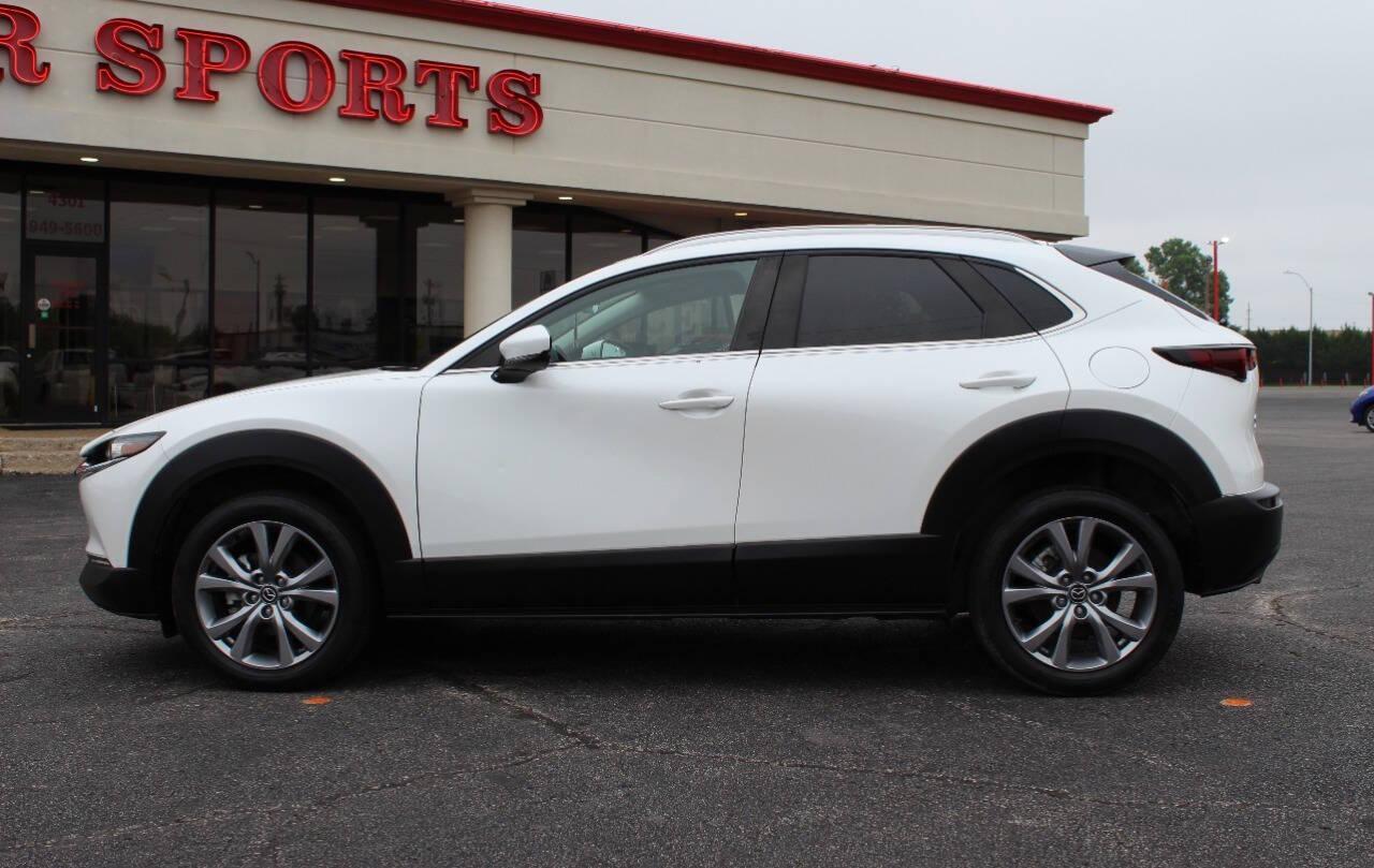 2023 White Mazda CX-30 Preferred AWD (3MVDMBCM1PM) with an 2.5L L4 DOHC 16V engine, 6A transmission, located at 4301 NW 39th , Oklahoma City, OK, 73112, (405) 949-5600, 35.512135, -97.598671 - NO DRIVERS LICENCE -NO FULL COVERAGE INSURANCE - NO CREDIT CHECK. COME ON OVER TO SUPERSPORTS, TAKE A LOOK AND TEST DRIVE. PLEASE GIVE US A CALL AT (405) 949-5600. NO LICENCIA DE CONDUCIR - NO SEGURO DE COBERTURA TOTAL - NO VERIFICACION DE CREDITO. VISITENOS EN SUPERSPORTS, MIRE NUESTRO - Photo#5