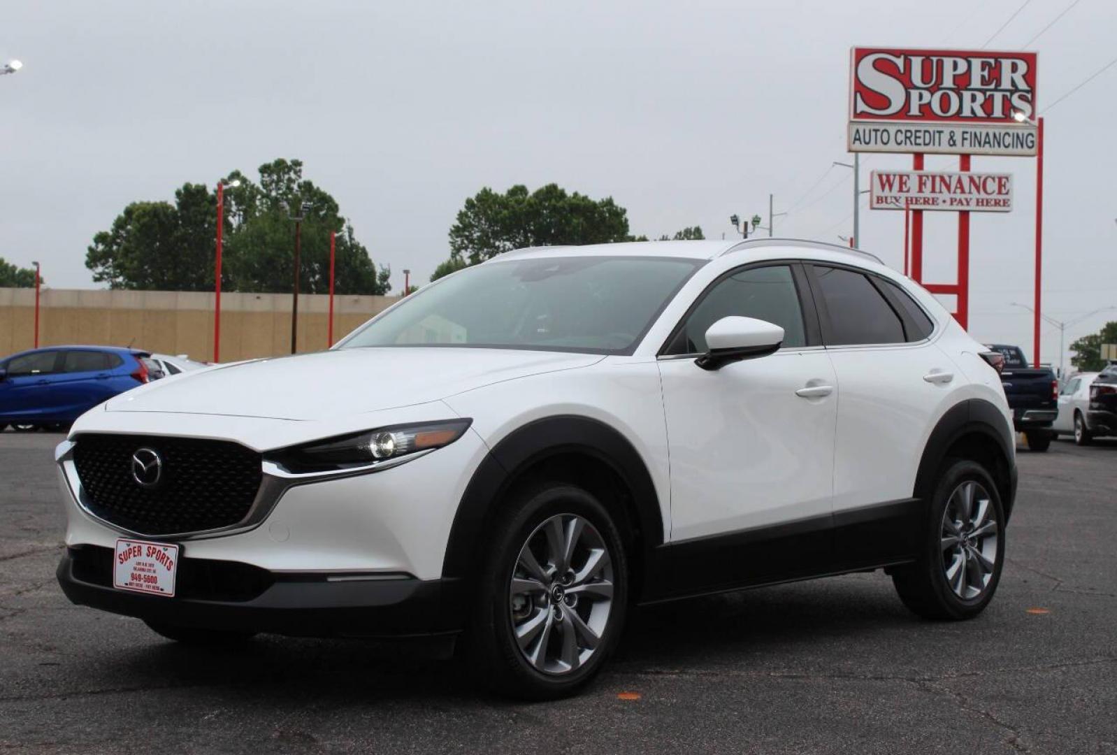2023 White Mazda CX-30 Preferred AWD (3MVDMBCM1PM) with an 2.5L L4 DOHC 16V engine, 6A transmission, located at 4301 NW 39th , Oklahoma City, OK, 73112, (405) 949-5600, 35.512135, -97.598671 - NO DRIVERS LICENCE NO - FULL COVERAGE INSURANCE - NO CREDIT CHECK. COME ON OVER TO SUPERSPORTS AND TAKE A LOOK AND TEST DRIVE . PLEASE GIVE US A CALL AT (405) 949-5600. NO LICENCIA DE MANEJAR - NO SEGURO DE COBERTURA TOTAL - NO VERIFICACION DE CREDITO. POR FAVOR VENGAN A SUPERSPORTS, ECHE - Photo#7