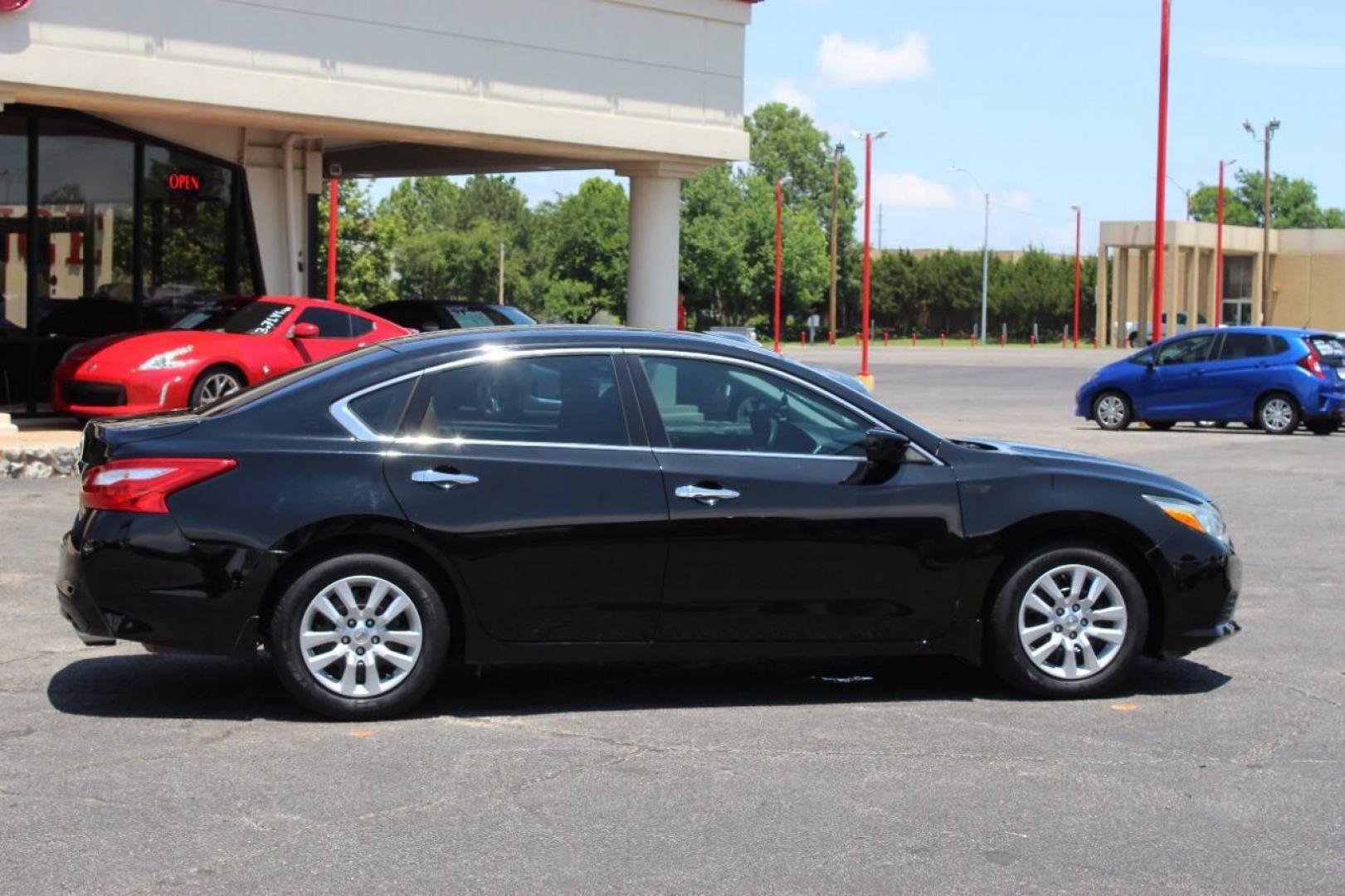 2017 Black Nissan Altima 2.5 S (1N4AL3AP8HN) with an 2.5L L4 DOHC 16V engine, CVT transmission, located at 4301 NW 39th , Oklahoma City, OK, 73112, (405) 949-5600, 35.512135, -97.598671 - NO DRIVERS LICENCE -NO FULL COVERAGE INSURANCE - NO CREDIT CHECK. COME ON OVER TO SUPERSPORTS, TAKE A LOOK AND TEST DRIVE. PLEASE GIVE US A CALL AT (405) 949-5600. NO LICENCIA DE CONDUCIR - NO SEGURO DE COBERTURA TOTAL - NO VERIFICACION DE CREDITO. VISITENOS EN SUPERSPORTS, MIRE NUESTRO - Photo#3