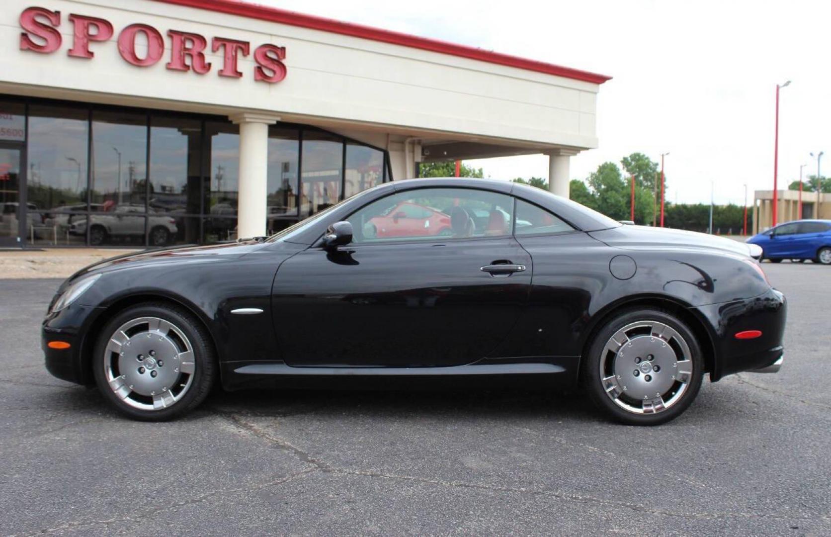 2005 Black Lexus SC 430 Convertible (JTHFN48YX50) with an 4.3L V8 DOHC 32V engine, 5-Speed Automatic Overdrive transmission, located at 4301 NW 39th , Oklahoma City, OK, 73112, (405) 949-5600, 35.512135, -97.598671 - NO DRIVERS LICENCE -NO FULL COVERAGE INSURANCE - NO CREDIT CHECK. COME ON OVER TO SUPERSPORTS, TAKE A LOOK AND TEST DRIVE . PLEASE GIVE US A CALL AT (405) 949-5600. NO LICENCIA DE CONDUCIR - NO SEGURO DE COBERTURA TOTAL - NO VERIFICACION DE CREDITO. VISITENOS EN SUPERSPORTS, MIRE NUESTR - Photo#6