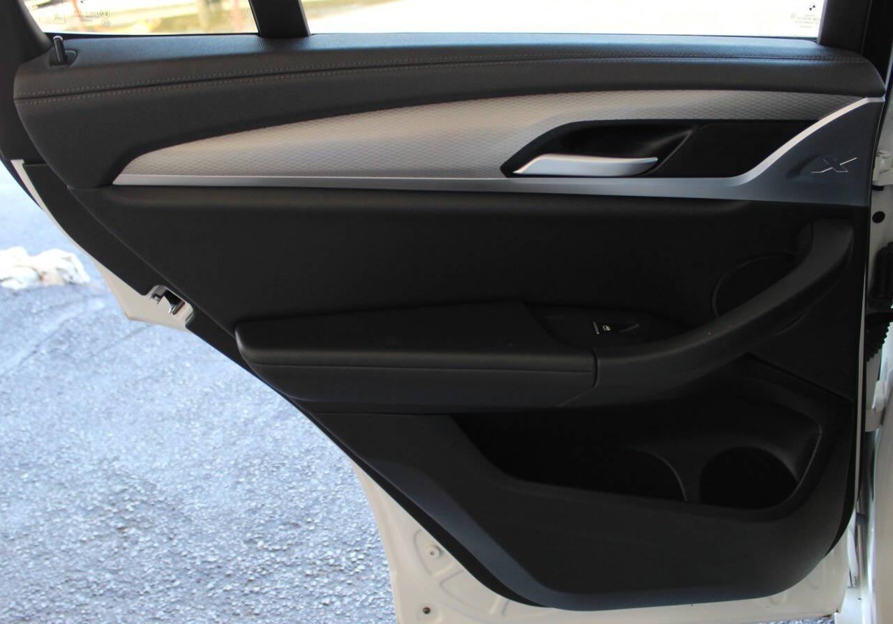 2018 White BMW X3 M40i (5UXTS3C51J0) with an 3.0L I6 Turbocharger 3.0L I6 engine, Automatic 8-Speed transmission, located at 4301 NW 39th , Oklahoma City, OK, 73112, (405) 949-5600, 35.512135, -97.598671 - NO DRIVERS LICENCE NO - FULL COVERAGE INSURANCE - NO CREDIT CHECK. COME ON OVER TO SUPERSPORTS AND TAKE A LOOK AND TEST DRIVE. PLEASE GIVE US A CALL AT (405) 949-5600. NO LICENCIA DE CONDUCIR - NO SEGURO DE COBERTURA TOTAL - NO VERIFICACION DE CREDITO. VISITENOS EN SUPERSPORTS, MIRE NUE - Photo#14