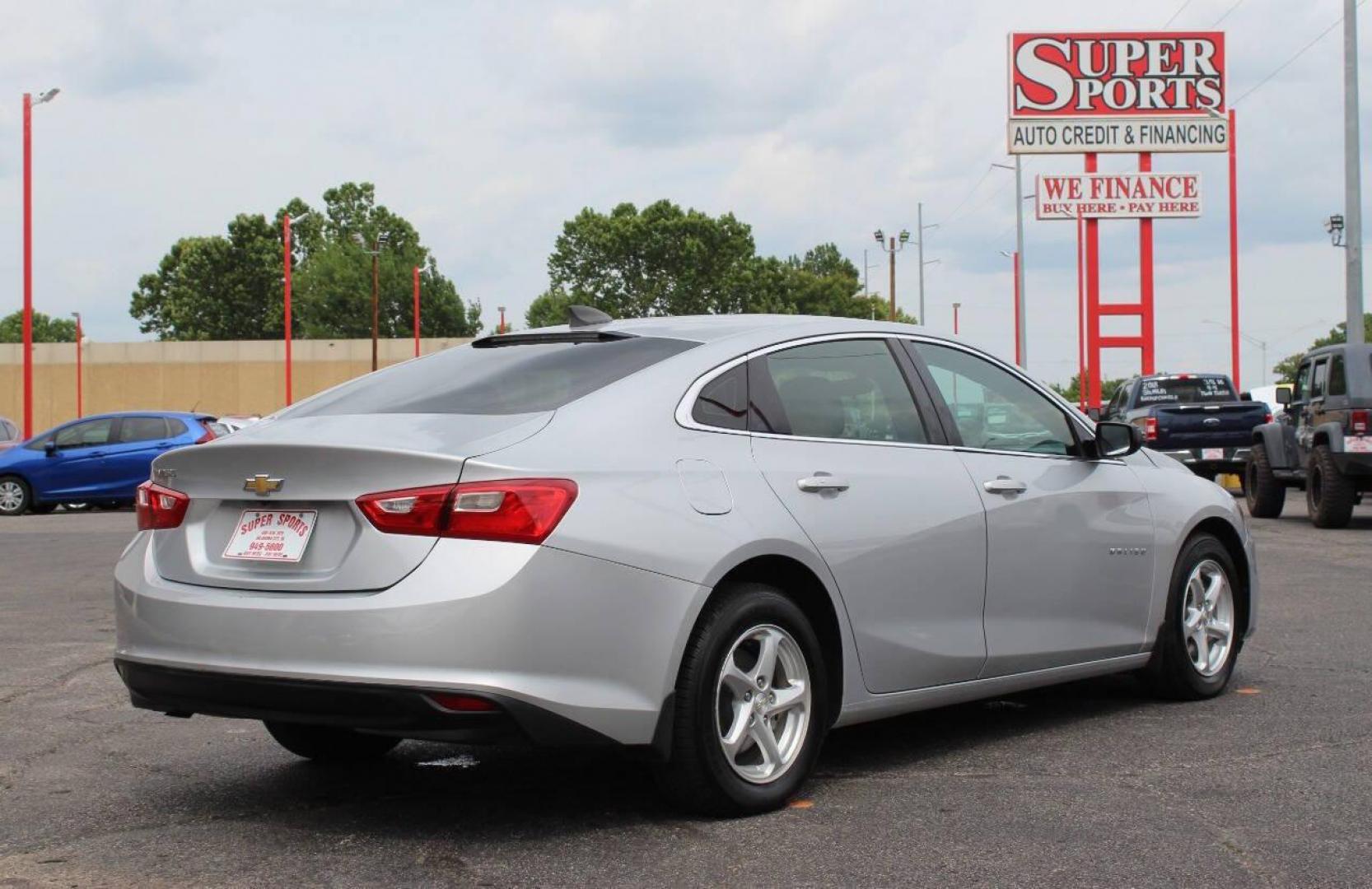 2018 Silver Chevrolet Malibu LS (1G1ZB5ST6JF) with an 1.5L L4 DOHC 16V engine, 6A transmission, located at 4301 NW 39th , Oklahoma City, OK, 73112, (405) 949-5600, 35.512135, -97.598671 - NO DRIVERS LICENCE -NO FULL COVERAGE INSURANCE - NO CREDIT CHECK. COME ON OVER TO SUPERSPORTS, TAKE A LOOK AND TEST DRIVE. PLEASE GIVE US A CALL AT (405) 949-5600. NO LICENCIA DE CONDUCIR - NO SEGURO DE COBERTURA TOTAL - NO VERIFICACION DE CREDITO. VISITENOS EN SUPERSPORTS, MIRE NUESTRO - Photo#4