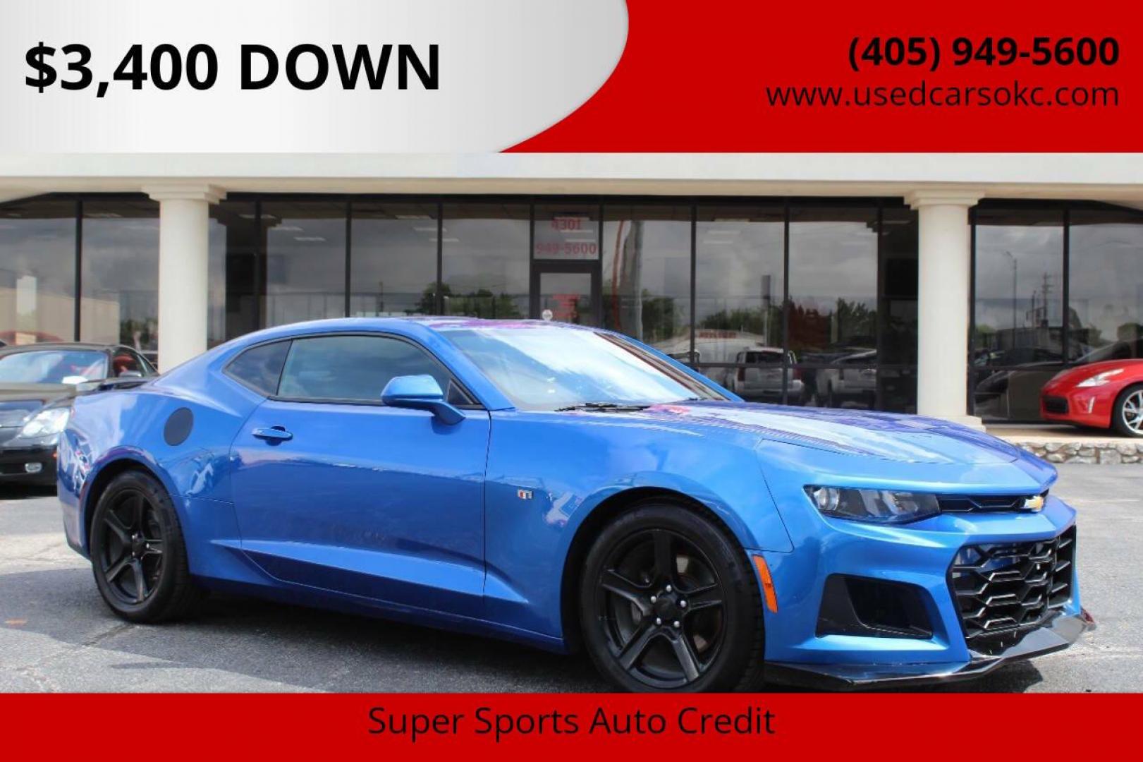 2018 Blue Chevrolet Camaro 1LT Coupe (1G1FB1RX8J0) with an 2.0L L4 DOHC 16V TURBO engine, 6A transmission, located at 4301 NW 39th , Oklahoma City, OK, 73112, (405) 949-5600, 35.512135, -97.598671 - NO DRIVERS LICENCE -NO FULL COVERAGE INSURANCE - NO CREDIT CHECK. COME ON OVER TO SUPERSPORTS, TAKE A LOOK AND TEST DRIVE. PLEASE GIVE US A CALL AT (405) 949-5600. NO LICENCIA DE CONDUCIR - NO SEGURO DE COBERTURA TOTAL - NO VERIFICACION DE CREDITO. VISITENOS EN SUPERSPORTS, MIRE NUESTRO - Photo#0