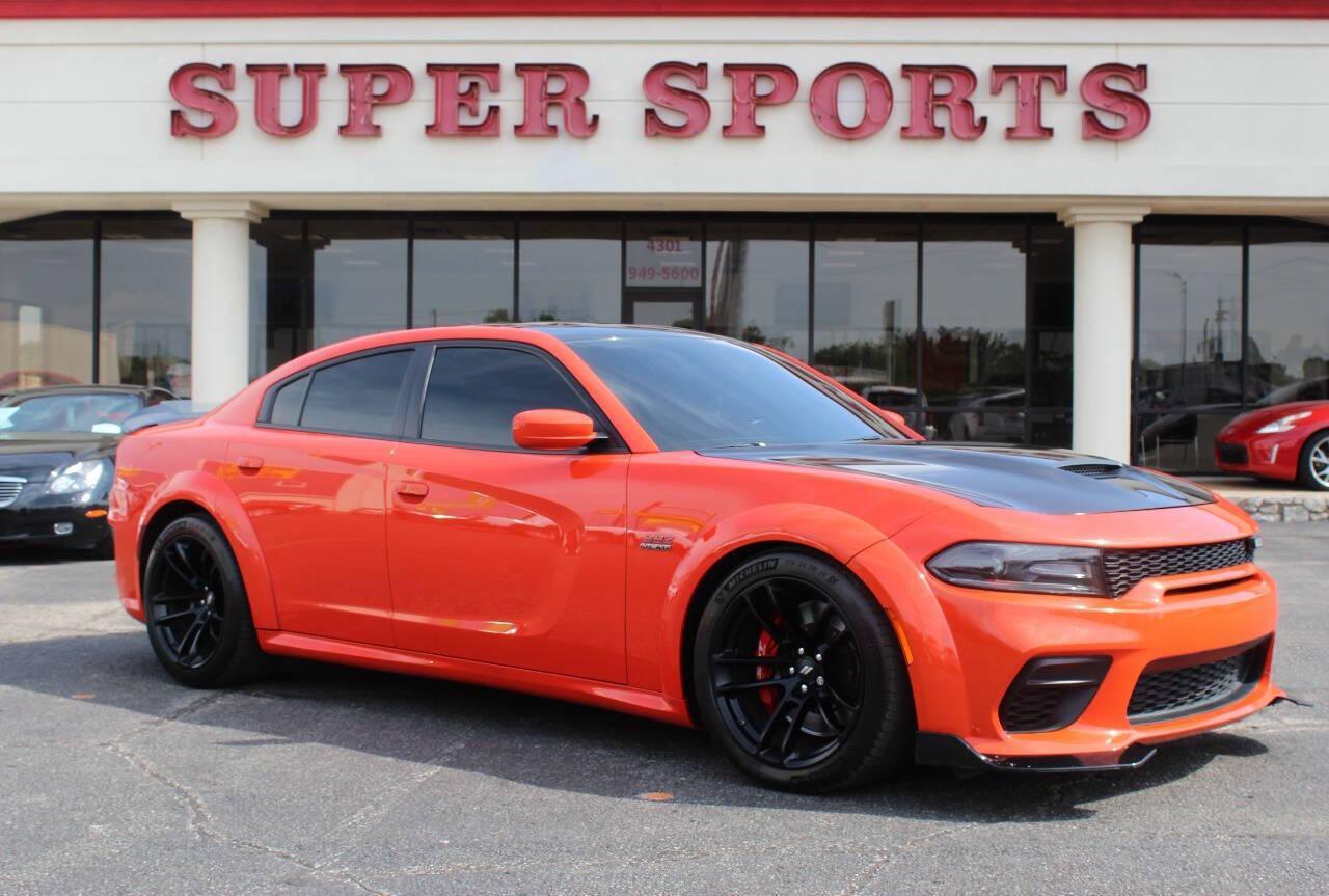 2021 Orange Dodge Charger Scat Pack (2C3CDXGJ8MH) with an 6.4L V8 OHV 16V engine, 8A transmission, located at 4301 NW 39th , Oklahoma City, OK, 73112, (405) 949-5600, 35.512135, -97.598671 - NO DRIVERS LICENCE -NO FULL COVERAGE INSURANCE - NO CREDIT CHECK. COME ON OVER TO SUPERSPORTS, TAKE A LOOK AND TEST DRIVE. PLEASE GIVE US A CALL AT (405) 949-5600. NO LICENCIA DE CONDUCIR - NO SEGURO DE COBERTURA TOTAL - NO VERIFICACION DE CREDITO. VISITENOS EN SUPERSPORTS, MIRE NUESTRO - Photo#0