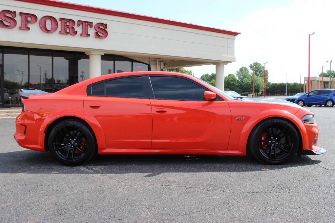 2021 Orange Dodge Charger Scat Pack (2C3CDXGJ8MH) with an 6.4L V8 OHV 16V engine, 8A transmission, located at 4301 NW 39th , Oklahoma City, OK, 73112, (405) 949-5600, 35.512135, -97.598671 - NO DRIVERS LICENCE -NO FULL COVERAGE INSURANCE - NO CREDIT CHECK. COME ON OVER TO SUPERSPORTS, TAKE A LOOK AND TEST DRIVE. PLEASE GIVE US A CALL AT (405) 949-5600. NO LICENCIA DE CONDUCIR - NO SEGURO DE COBERTURA TOTAL - NO VERIFICACION DE CREDITO. VISITENOS EN SUPERSPORTS, MIRE NUESTRO - Photo#2