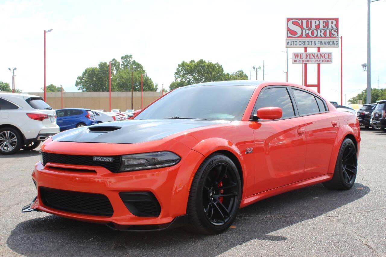 2021 Orange Dodge Charger Scat Pack (2C3CDXGJ8MH) with an 6.4L V8 OHV 16V engine, 8A transmission, located at 4301 NW 39th , Oklahoma City, OK, 73112, (405) 949-5600, 35.512135, -97.598671 - NO DRIVERS LICENCE -NO FULL COVERAGE INSURANCE - NO CREDIT CHECK. COME ON OVER TO SUPERSPORTS, TAKE A LOOK AND TEST DRIVE. PLEASE GIVE US A CALL AT (405) 949-5600. NO LICENCIA DE CONDUCIR - NO SEGURO DE COBERTURA TOTAL - NO VERIFICACION DE CREDITO. VISITENOS EN SUPERSPORTS, MIRE NUESTRO - Photo#6