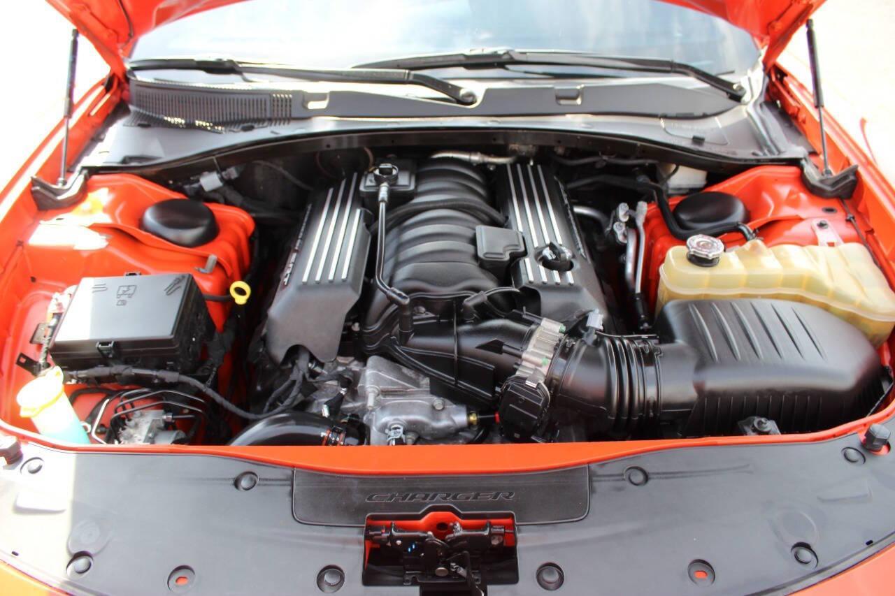 2021 Orange Dodge Charger Scat Pack (2C3CDXGJ8MH) with an 6.4L V8 OHV 16V engine, 8A transmission, located at 4301 NW 39th , Oklahoma City, OK, 73112, (405) 949-5600, 35.512135, -97.598671 - NO DRIVERS LICENCE -NO FULL COVERAGE INSURANCE - NO CREDIT CHECK. COME ON OVER TO SUPERSPORTS, TAKE A LOOK AND TEST DRIVE. PLEASE GIVE US A CALL AT (405) 949-5600. NO LICENCIA DE CONDUCIR - NO SEGURO DE COBERTURA TOTAL - NO VERIFICACION DE CREDITO. VISITENOS EN SUPERSPORTS, MIRE NUESTRO - Photo#7