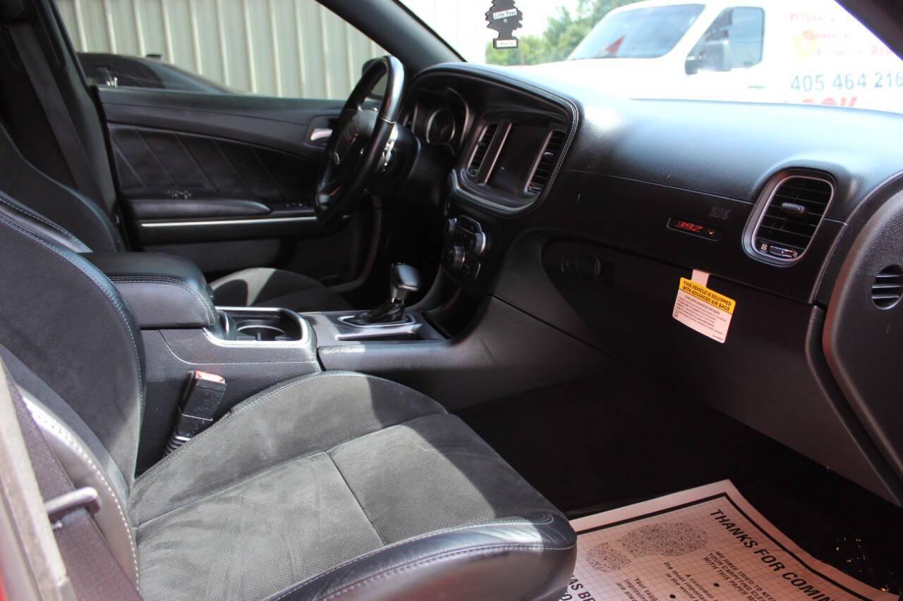 2021 Orange Dodge Charger Scat Pack (2C3CDXGJ8MH) with an 6.4L V8 OHV 16V engine, 8A transmission, located at 4301 NW 39th , Oklahoma City, OK, 73112, (405) 949-5600, 35.512135, -97.598671 - NO DRIVERS LICENCE -NO FULL COVERAGE INSURANCE - NO CREDIT CHECK. COME ON OVER TO SUPERSPORTS, TAKE A LOOK AND TEST DRIVE. PLEASE GIVE US A CALL AT (405) 949-5600. NO LICENCIA DE CONDUCIR - NO SEGURO DE COBERTURA TOTAL - NO VERIFICACION DE CREDITO. VISITENOS EN SUPERSPORTS, MIRE NUESTRO - Photo#8