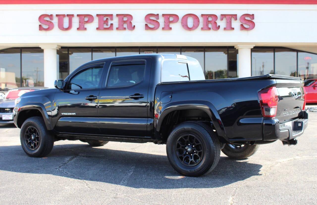 2021 Black Toyota Tacoma SR5 Double Cab Long Bed V6 6AT 4WD (3TMCZ5AN1MM) with an 3.5L V6 DOHC 24V engine, 6A transmission, located at 4301 NW 39th , Oklahoma City, OK, 73112, (405) 949-5600, 35.512135, -97.598671 - NO DRIVERS LICENCE -NO FULL COVERAGE INSURANCE - NO CREDIT CHECK. COME ON OVER TO SUPERSPORTS, TAKE A LOOK AND TEST DRIVE. PLEASE GIVE US A CALL AT (405) 949-5600. NO LICENCIA DE CONDUCIR - NO SEGURO DE COBERTURA TOTAL - NO VERIFICACION DE CREDITO. VISITENOS EN SUPERSPORTS, MIRE NUESTRO N - Photo#4