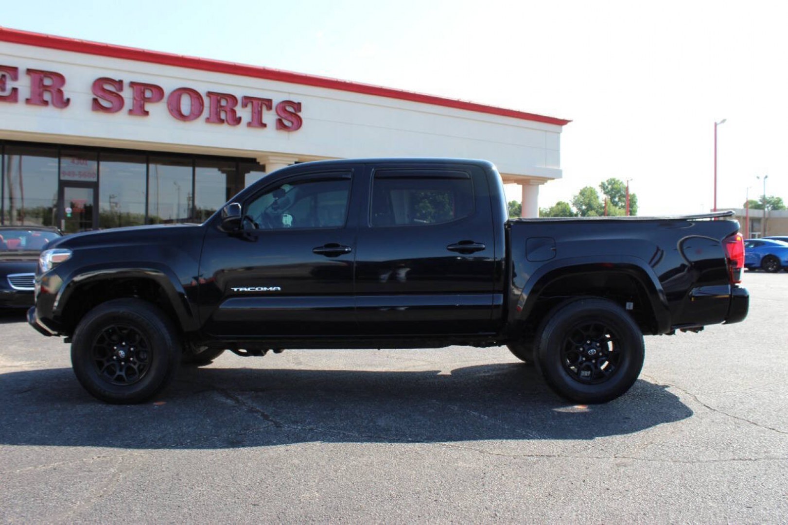 2021 Black Toyota Tacoma SR5 Double Cab Long Bed V6 6AT 4WD (3TMCZ5AN1MM) with an 3.5L V6 3.5L V6 engine, Automatic 6-Speed transmission, located at 4301 NW 39th , Oklahoma City, OK, 73112, (405) 949-5600, 35.512135, -97.598671 - Hablamos espanol. SPEND SMART --- BUY FROM SUPER SPORTS. ALL PRICES, DOWN PAYMENTS, PAYMENTS, AND FINANCE TERMS ARE NEGOTIABLE AT THE TIME OF APPROVAL. WE WILL WORK WITH YOU TO FIT YOUR BUDGET. WE WILL EVEN LOWER AND ADJUST THE NUMBERS TO HELP MAKE THE VE HICLE MORE AFFORDABLE FOR YOU.- Photo#5