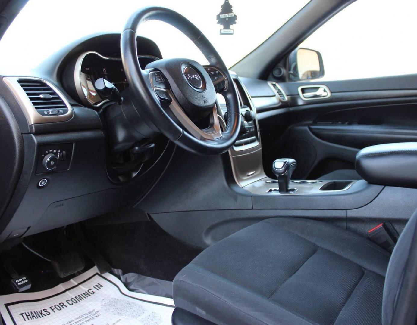 2015 Charcoal Jeep Grand Cherokee Laredo 4WD (1C4RJFAG9FC) with an 3.6L V6 DOHC 24V engine, 8-Speed Automatic transmission, located at 4301 NW 39th , Oklahoma City, OK, 73112, (405) 949-5600, 35.512135, -97.598671 - NO DRIVERS LICENCE -NO FULL COVERAGE INSURANCE - NO CREDIT CHECK. COME ON OVER TO SUPERSPORTS, TAKE A LOOK AND TEST DRIVE. PLEASE GIVE US A CALL AT (405) 949-5600. NO LICENCIA DE CONDUCIR - NO SEGURO DE COBERTURA TOTAL - NO VERIFICACION DE CREDITO. VISITENOS EN SUPERSPORTS, MIRE N - Photo#16