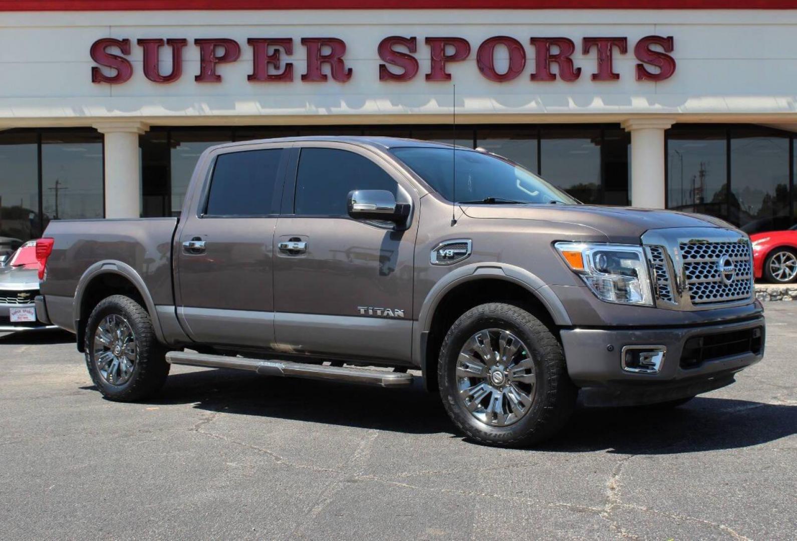 2017 Tan Nissan Titan Platinum Reserve Crew Cab 4WD (1N6AA1E57HN) with an 5.6L V8 5.6L V8 engine, Automatic 7-Speed transmission, located at 4301 NW 39th , Oklahoma City, OK, 73112, (405) 949-5600, 35.512135, -97.598671 - Photo#0