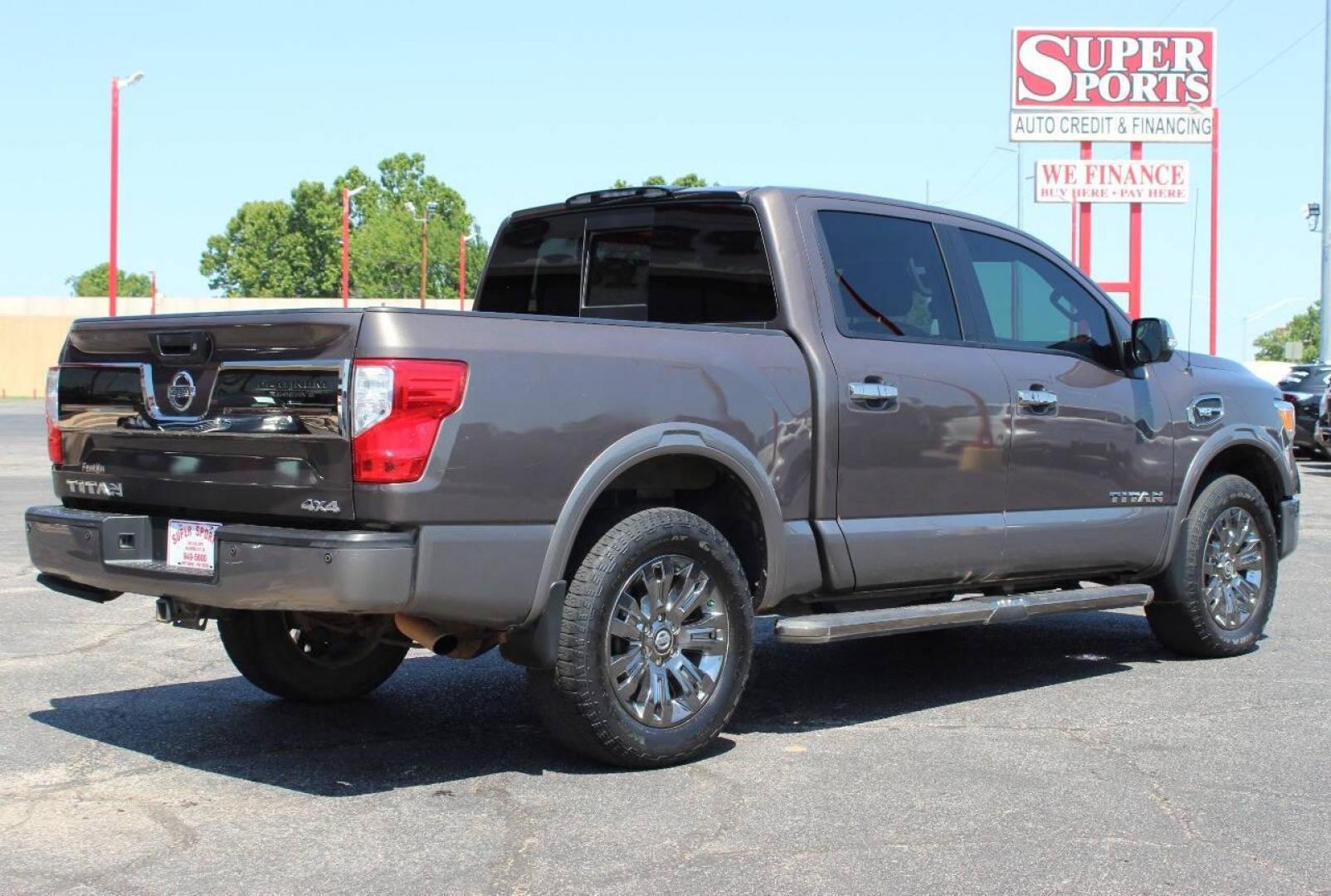 2017 Tan Nissan Titan Platinum Reserve Crew Cab 4WD (1N6AA1E57HN) with an 5.6L V8 5.6L V8 engine, Automatic 7-Speed transmission, located at 4301 NW 39th , Oklahoma City, OK, 73112, (405) 949-5600, 35.512135, -97.598671 - Photo#3