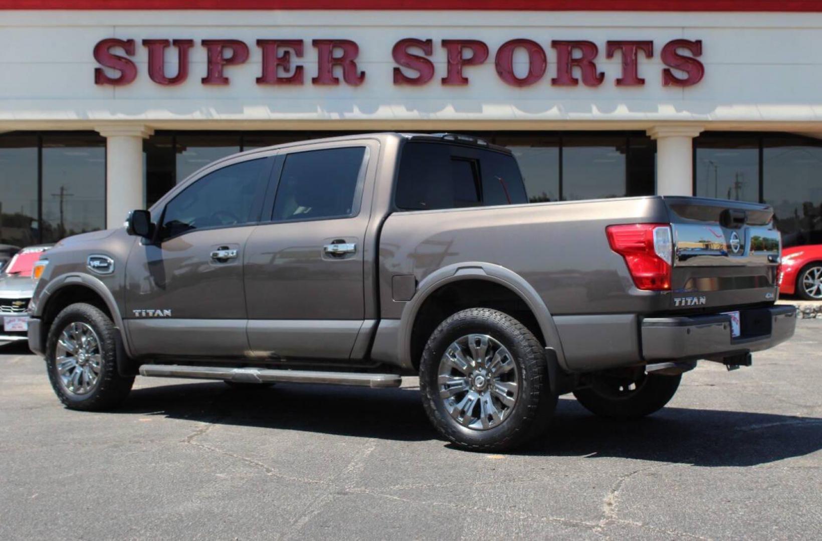 2017 Tan Nissan Titan Platinum Reserve Crew Cab 4WD (1N6AA1E57HN) with an 5.6L V8 5.6L V8 engine, Automatic 7-Speed transmission, located at 4301 NW 39th , Oklahoma City, OK, 73112, (405) 949-5600, 35.512135, -97.598671 - Photo#4