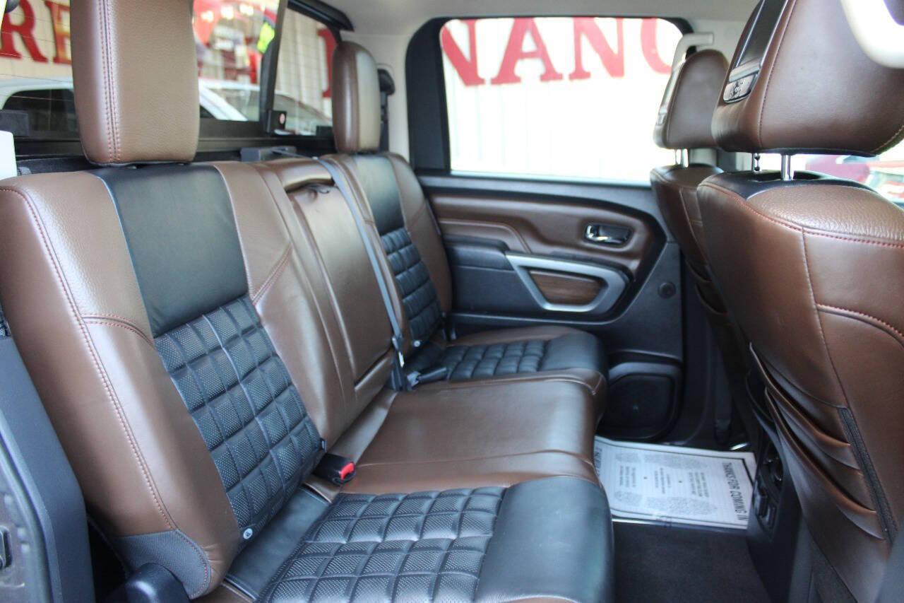 2017 Tan Nissan Titan Platinum Reserve Crew Cab 4WD (1N6AA1E57HN) with an 5.6L V8 5.6L V8 engine, Automatic 7-Speed transmission, located at 4301 NW 39th , Oklahoma City, OK, 73112, (405) 949-5600, 35.512135, -97.598671 - NO DRIVERS LICENCE -NO FULL COVERAGE INSURANCE - NO CREDIT CHECK. COME ON OVER TO SUPERSPORTS, TAKE A LOOK AND TEST DRIVE. PLEASE GIVE US A CALL AT (405) 949-5600. NO LICENCIA DE CONDUCIR - NO SEGURO DE COBERTURA TOTAL - NO VERIFICACION DE CREDITO. VISITENOS EN SUPERSPORTS, MIRE NUESTRO - Photo#10