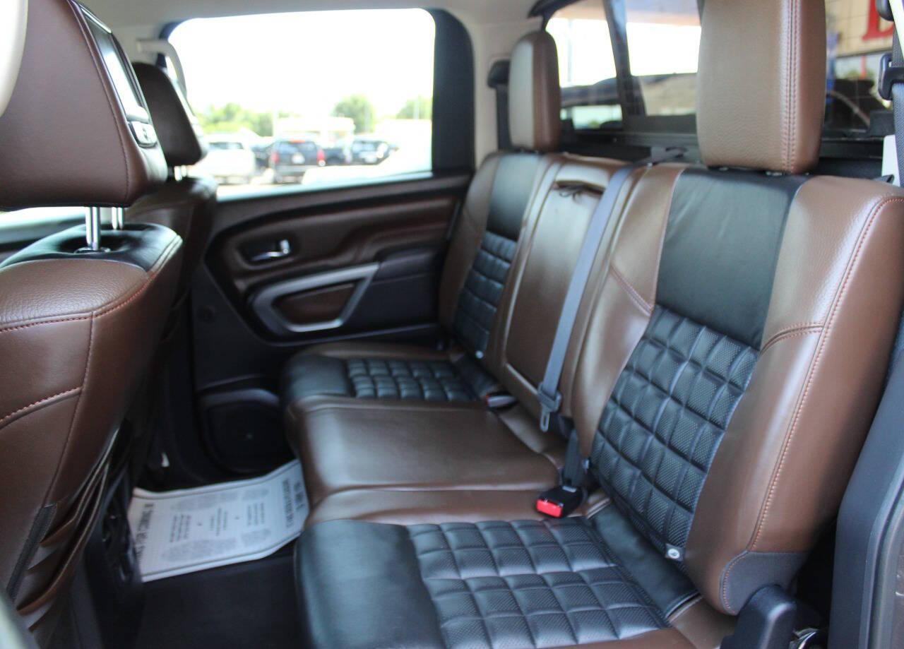 2017 Tan Nissan Titan Platinum Reserve Crew Cab 4WD (1N6AA1E57HN) with an 5.6L V8 5.6L V8 engine, Automatic 7-Speed transmission, located at 4301 NW 39th , Oklahoma City, OK, 73112, (405) 949-5600, 35.512135, -97.598671 - NO DRIVERS LICENCE -NO FULL COVERAGE INSURANCE - NO CREDIT CHECK. COME ON OVER TO SUPERSPORTS, TAKE A LOOK AND TEST DRIVE. PLEASE GIVE US A CALL AT (405) 949-5600. NO LICENCIA DE CONDUCIR - NO SEGURO DE COBERTURA TOTAL - NO VERIFICACION DE CREDITO. VISITENOS EN SUPERSPORTS, MIRE NUESTRO - Photo#12