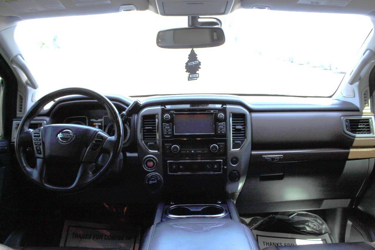 2017 Tan Nissan Titan Platinum Reserve Crew Cab 4WD (1N6AA1E57HN) with an 5.6L V8 5.6L V8 engine, Automatic 7-Speed transmission, located at 4301 NW 39th , Oklahoma City, OK, 73112, (405) 949-5600, 35.512135, -97.598671 - NO DRIVERS LICENCE -NO FULL COVERAGE INSURANCE - NO CREDIT CHECK. COME ON OVER TO SUPERSPORTS, TAKE A LOOK AND TEST DRIVE. PLEASE GIVE US A CALL AT (405) 949-5600. NO LICENCIA DE CONDUCIR - NO SEGURO DE COBERTURA TOTAL - NO VERIFICACION DE CREDITO. VISITENOS EN SUPERSPORTS, MIRE NUESTRO - Photo#16