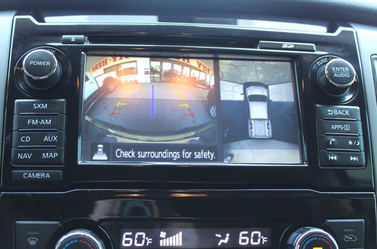 2017 Tan Nissan Titan Platinum Reserve Crew Cab 4WD (1N6AA1E57HN) with an 5.6L V8 5.6L V8 engine, Automatic 7-Speed transmission, located at 4301 NW 39th , Oklahoma City, OK, 73112, (405) 949-5600, 35.512135, -97.598671 - NO DRIVERS LICENCE -NO FULL COVERAGE INSURANCE - NO CREDIT CHECK. COME ON OVER TO SUPERSPORTS, TAKE A LOOK AND TEST DRIVE. PLEASE GIVE US A CALL AT (405) 949-5600. NO LICENCIA DE CONDUCIR - NO SEGURO DE COBERTURA TOTAL - NO VERIFICACION DE CREDITO. VISITENOS EN SUPERSPORTS, MIRE NUESTRO - Photo#19