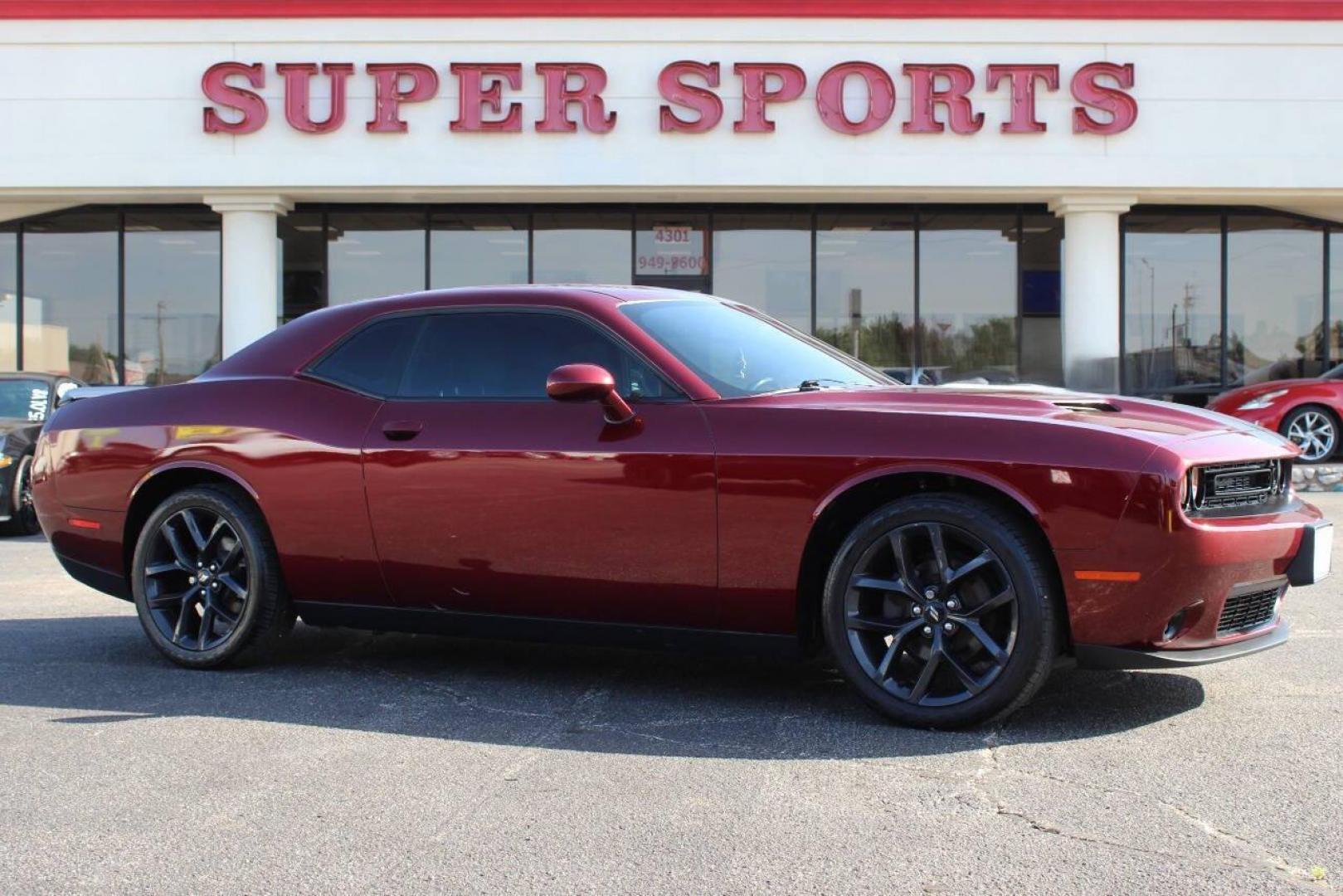 2019 Maroon Dodge Challenger SXT (2C3CDZAG8KH) with an 3.6L V6 DOHC 24V engine, 8A transmission, located at 4301 NW 39th , Oklahoma City, OK, 73112, (405) 949-5600, 35.512135, -97.598671 - NO DRIVERS LICENCE -NO FULL COVERAGE INSURANCE - NO CREDIT CHECK. COME ON OVER TO SUPERSPORTS, TAKE A LOOK AND TEST DRIVE. PLEASE GIVE US A CALL AT (405) 949-5600. NO LICENCIA DE CONDUCIR - NO SEGURO DE COBERTURA TOTAL - NO VERIFICACION DE CREDITO. VISITENOS EN SUPERSPORTS, MIRE N - Photo#2