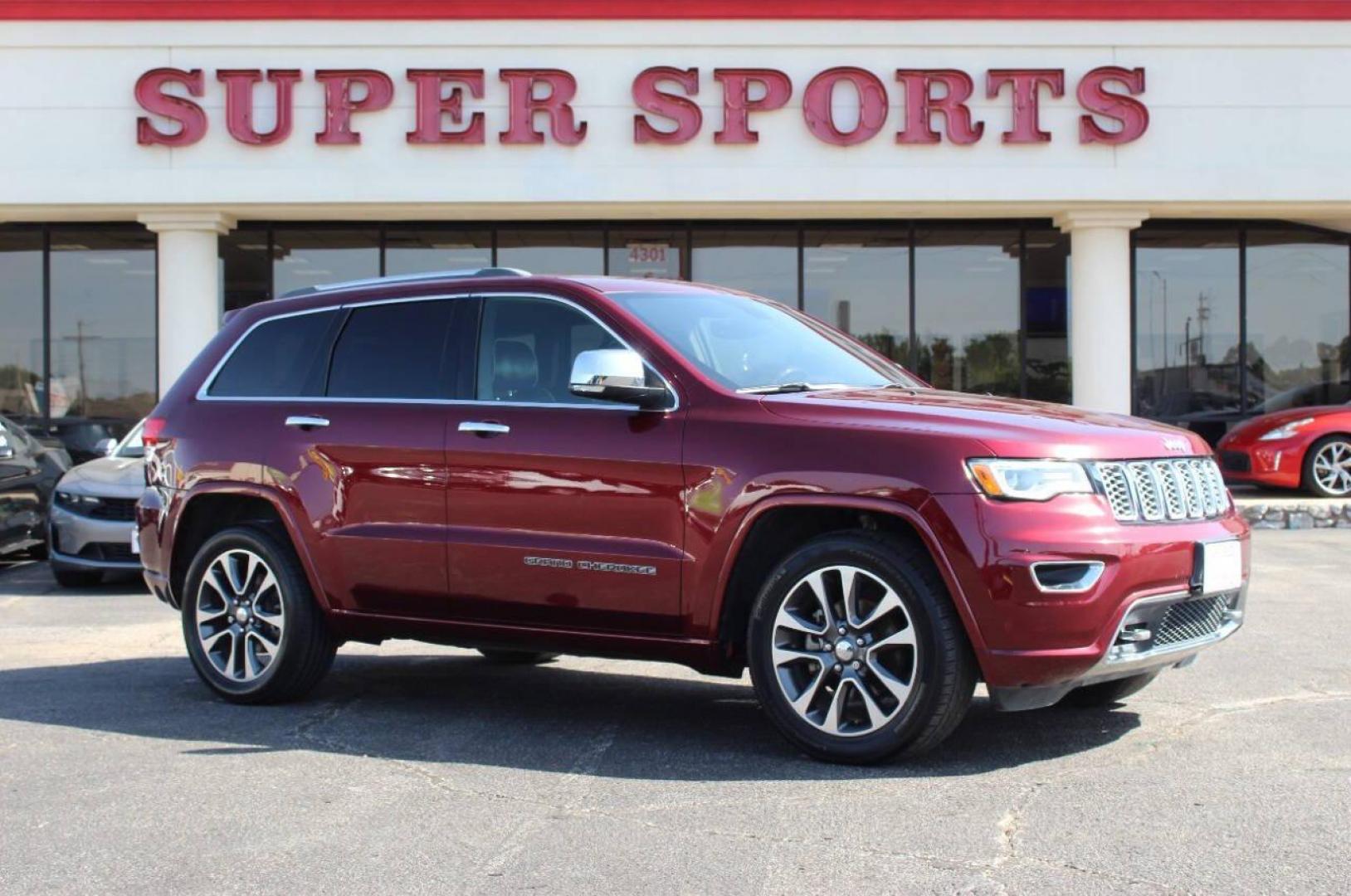 2018 Maroon Jeep Grand Cherokee Overland 2WD (1C4RJECG8JC) with an 3.6L V6 DOHC 24V engine, 8A transmission, located at 4301 NW 39th , Oklahoma City, OK, 73112, (405) 949-5600, 35.512135, -97.598671 - NO DRIVERS LICENCE -NO FULL COVERAGE INSURANCE - NO CREDIT CHECK. COME ON OVER TO SUPERSPORTS, TAKE A LOOK AND TEST DRIVE. PLEASE GIVE US A CALL AT (405) 949-5600. NO LICENCIA DE CONDUCIR - NO SEGURO DE COBERTURA TOTAL - NO VERIFICACION DE CREDITO. VISITENOS EN SUPERSPORTS, MIRE NUESTRO - Photo#2