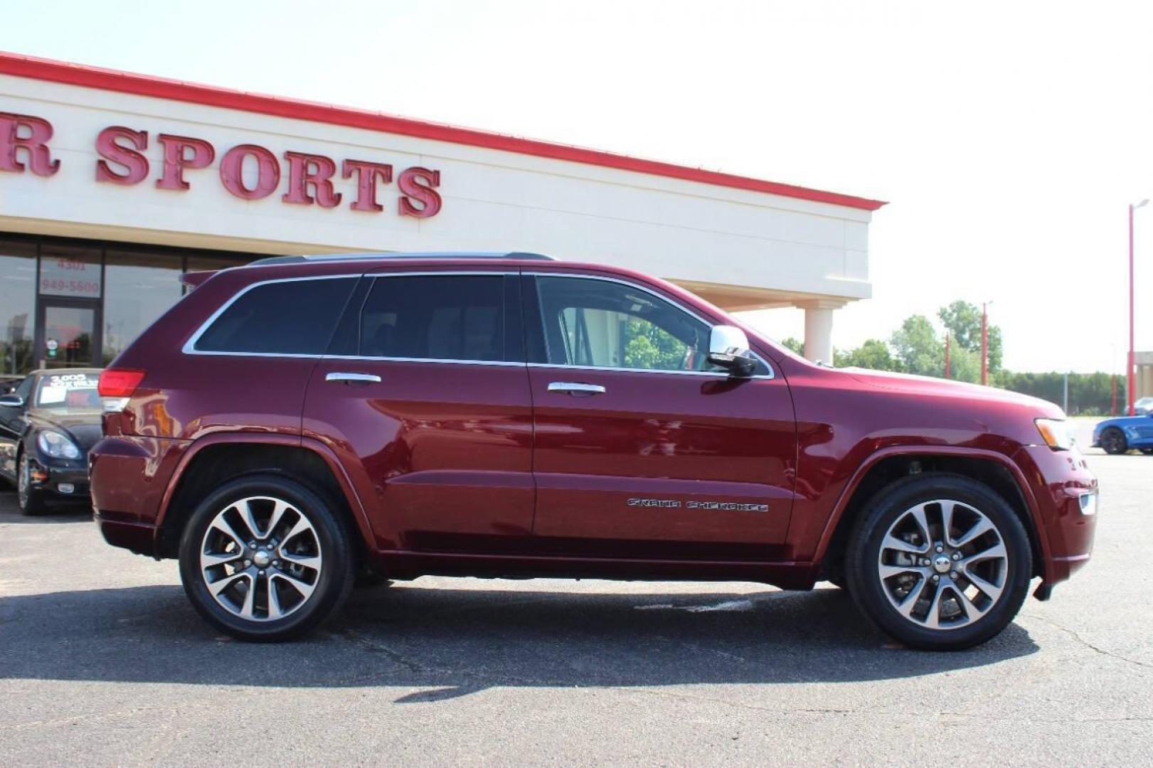 2018 Maroon Jeep Grand Cherokee Overland 2WD (1C4RJECG8JC) with an 3.6L V6 DOHC 24V engine, 8A transmission, located at 4301 NW 39th , Oklahoma City, OK, 73112, (405) 949-5600, 35.512135, -97.598671 - NO DRIVERS LICENCE -NO FULL COVERAGE INSURANCE - NO CREDIT CHECK. COME ON OVER TO SUPERSPORTS, TAKE A LOOK AND TEST DRIVE. PLEASE GIVE US A CALL AT (405) 949-5600. NO LICENCIA DE CONDUCIR - NO SEGURO DE COBERTURA TOTAL - NO VERIFICACION DE CREDITO. VISITENOS EN SUPERSPORTS, MIRE NUESTRO - Photo#3