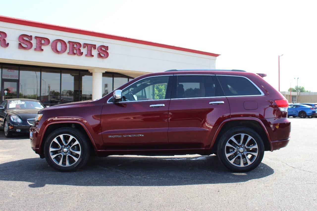 2018 Maroon Jeep Grand Cherokee Overland 2WD (1C4RJECG8JC) with an 3.6L V6 DOHC 24V engine, 8A transmission, located at 4301 NW 39th , Oklahoma City, OK, 73112, (405) 949-5600, 35.512135, -97.598671 - NO DRIVERS LICENCE -NO FULL COVERAGE INSURANCE - NO CREDIT CHECK. COME ON OVER TO SUPERSPORTS, TAKE A LOOK AND TEST DRIVE. PLEASE GIVE US A CALL AT (405) 949-5600. NO LICENCIA DE CONDUCIR - NO SEGURO DE COBERTURA TOTAL - NO VERIFICACION DE CREDITO. VISITENOS EN SUPERSPORTS, MIRE NUESTRO - Photo#5