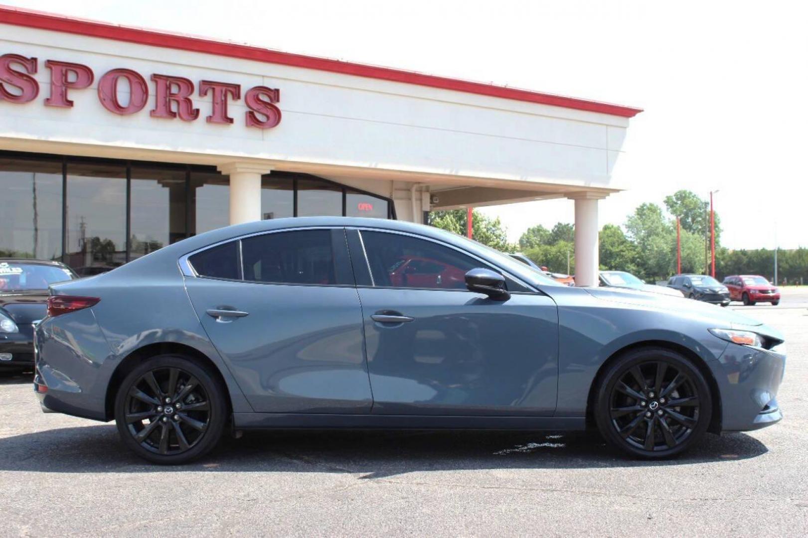 2022 Gray Mazda MAZDA3 Preferred (3MZBPACL0NM) with an 2.5L L4 DOHC 16V engine, 6A transmission, located at 4301 NW 39th , Oklahoma City, OK, 73112, (405) 949-5600, 35.512135, -97.598671 - NO DRIVERS LICENCE -NO FULL COVERAGE INSURANCE - NO CREDIT CHECK. COME ON OVER TO SUPERSPORTS, TAKE A LOOK AND TEST DRIVE. PLEASE GIVE US A CALL AT (405) 949-5600. NO LICENCIA DE CONDUCIR - NO SEGURO DE COBERTURA TOTAL - NO VERIFICACION DE CREDITO. VISITENOS EN SUPERSPORTS, MIRE NUESTRO - Photo#2