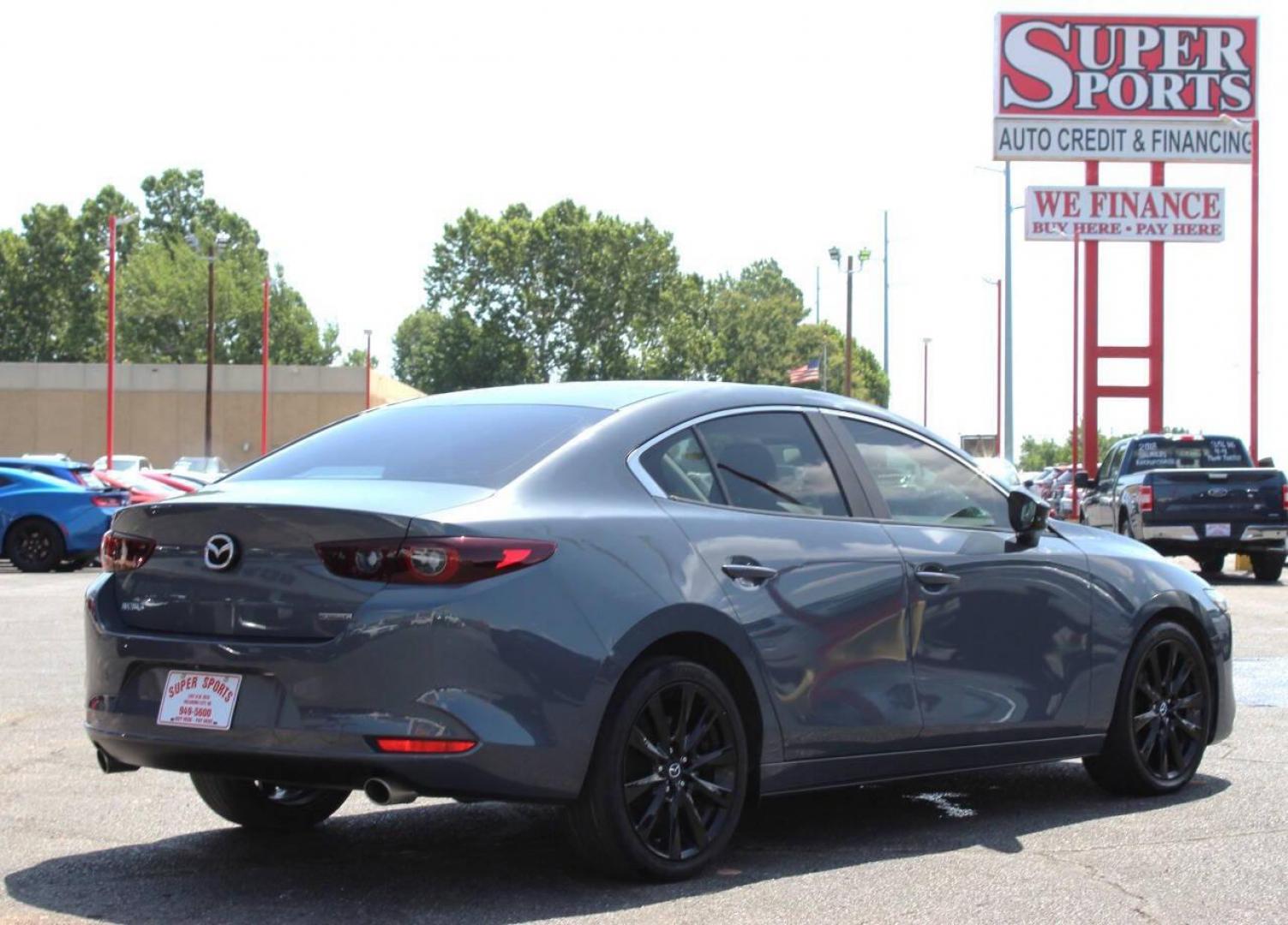 2022 Gray Mazda MAZDA3 Preferred (3MZBPACL0NM) with an 2.5L L4 DOHC 16V engine, 6A transmission, located at 4301 NW 39th , Oklahoma City, OK, 73112, (405) 949-5600, 35.512135, -97.598671 - NO DRIVERS LICENCE -NO FULL COVERAGE INSURANCE - NO CREDIT CHECK. COME ON OVER TO SUPERSPORTS, TAKE A LOOK AND TEST DRIVE. PLEASE GIVE US A CALL AT (405) 949-5600. NO LICENCIA DE CONDUCIR - NO SEGURO DE COBERTURA TOTAL - NO VERIFICACION DE CREDITO. VISITENOS EN SUPERSPORTS, MIRE NUESTRO - Photo#3