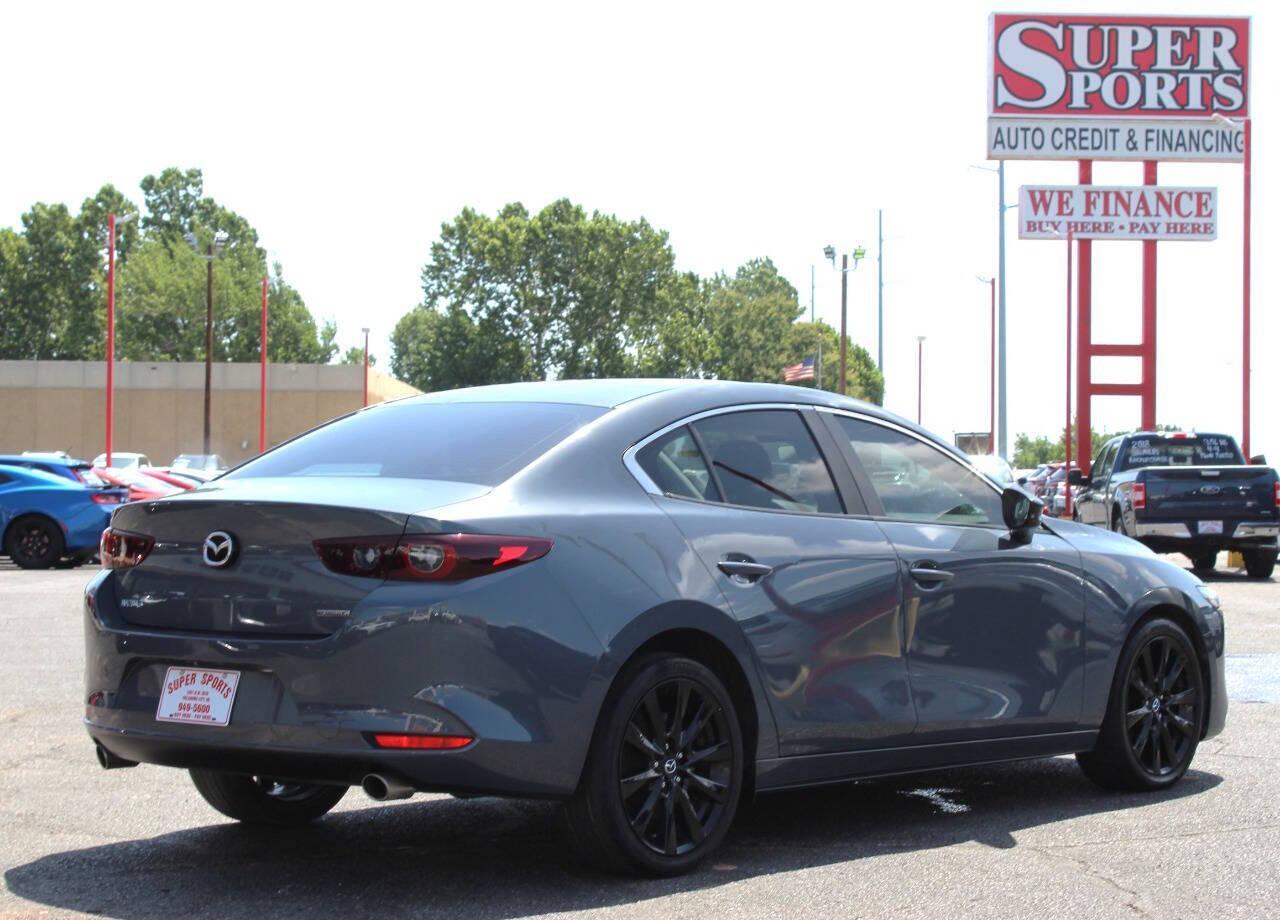 2022 Gray Mazda MAZDA3 Preferred (3MZBPACL0NM) with an 2.5L L4 DOHC 16V engine, 6A transmission, located at 4301 NW 39th , Oklahoma City, OK, 73112, (405) 949-5600, 35.512135, -97.598671 - NO DRIVERS LICENCE -NO FULL COVERAGE INSURANCE - NO CREDIT CHECK. COME ON OVER TO SUPERSPORTS, TAKE A LOOK AND TEST DRIVE. PLEASE GIVE US A CALL AT (405) 949-5600. NO LICENCIA DE CONDUCIR - NO SEGURO DE COBERTURA TOTAL - NO VERIFICACION DE CREDITO. VISITENOS EN SUPERSPORTS, MIRE NUESTRO - Photo#2