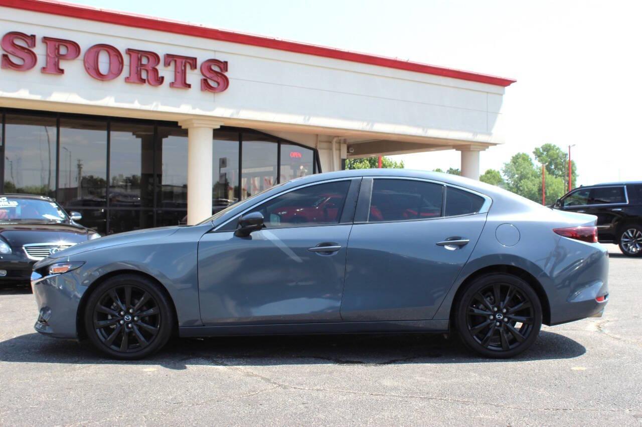 2022 Gray Mazda MAZDA3 Preferred (3MZBPACL0NM) with an 2.5L L4 DOHC 16V engine, 6A transmission, located at 4301 NW 39th , Oklahoma City, OK, 73112, (405) 949-5600, 35.512135, -97.598671 - NO DRIVERS LICENCE -NO FULL COVERAGE INSURANCE - NO CREDIT CHECK. COME ON OVER TO SUPERSPORTS, TAKE A LOOK AND TEST DRIVE. PLEASE GIVE US A CALL AT (405) 949-5600. NO LICENCIA DE CONDUCIR - NO SEGURO DE COBERTURA TOTAL - NO VERIFICACION DE CREDITO. VISITENOS EN SUPERSPORTS, MIRE NUESTRO - Photo#4