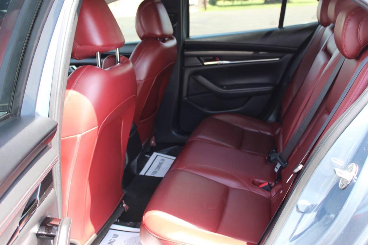 2022 Gray Mazda MAZDA3 Preferred (3MZBPACL0NM) with an 2.5L L4 DOHC 16V engine, 6A transmission, located at 4301 NW 39th , Oklahoma City, OK, 73112, (405) 949-5600, 35.512135, -97.598671 - NO DRIVERS LICENCE -NO FULL COVERAGE INSURANCE - NO CREDIT CHECK. COME ON OVER TO SUPERSPORTS, TAKE A LOOK AND TEST DRIVE. PLEASE GIVE US A CALL AT (405) 949-5600. NO LICENCIA DE CONDUCIR - NO SEGURO DE COBERTURA TOTAL - NO VERIFICACION DE CREDITO. VISITENOS EN SUPERSPORTS, MIRE NUESTRO - Photo#12