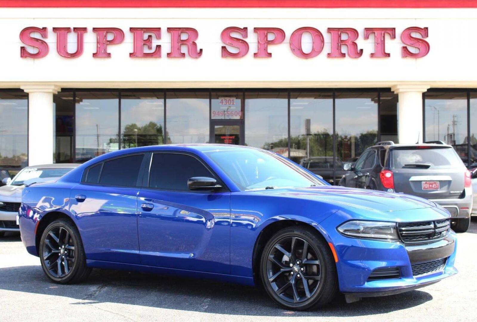 2022 Blue Dodge Charger SXT (2C3CDXBG8NH) with an 3.6L V6 DOHC 24V engine, 8A transmission, located at 4301 NW 39th , Oklahoma City, OK, 73112, (405) 949-5600, 35.512135, -97.598671 - NO DRIVERS LICENCE -NO FULL COVERAGE INSURANCE - NO CREDIT CHECK. COME ON OVER TO SUPERSPORTS, TAKE A LOOK AND TEST DRIVE. PLEASE GIVE US A CALL AT (405) 949-5600. NO LICENCIA DE CONDUCIR - NO SEGURO DE COBERTURA TOTAL - NO VERIFICACION DE CREDITO. VISITENOS EN SUPERSPORTS, MIRE NUESTRO - Photo#2