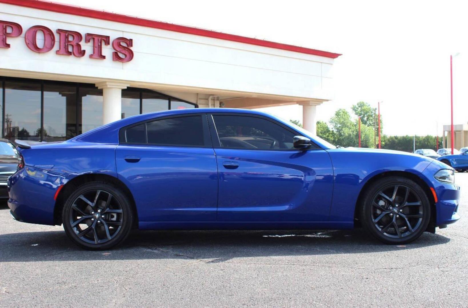 2022 Blue Dodge Charger SXT (2C3CDXBG8NH) with an 3.6L V6 DOHC 24V engine, 8A transmission, located at 4301 NW 39th , Oklahoma City, OK, 73112, (405) 949-5600, 35.512135, -97.598671 - NO DRIVERS LICENCE -NO FULL COVERAGE INSURANCE - NO CREDIT CHECK. COME ON OVER TO SUPERSPORTS, TAKE A LOOK AND TEST DRIVE. PLEASE GIVE US A CALL AT (405) 949-5600. NO LICENCIA DE CONDUCIR - NO SEGURO DE COBERTURA TOTAL - NO VERIFICACION DE CREDITO. VISITENOS EN SUPERSPORTS, MIRE NUESTRO - Photo#3