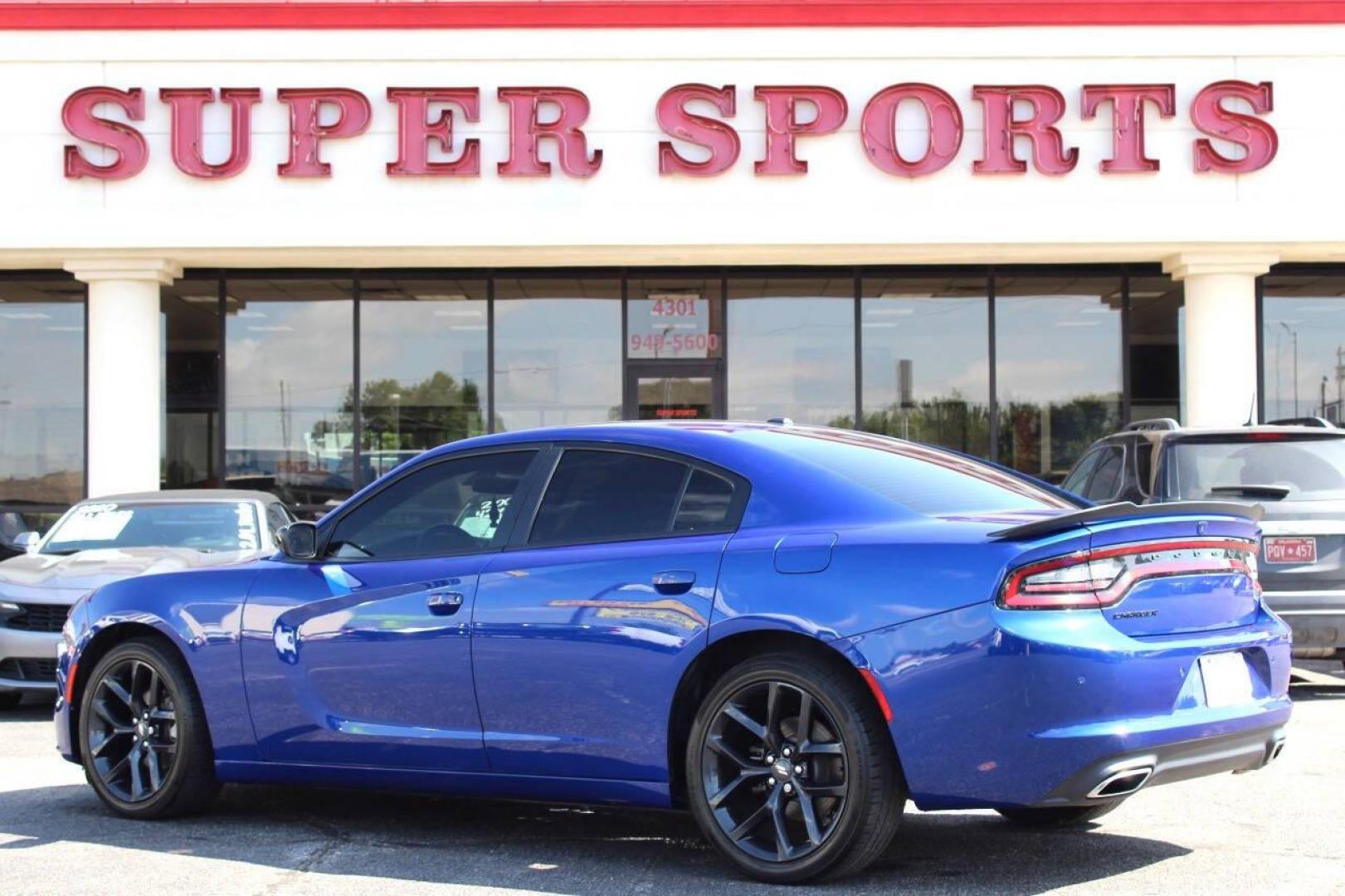 2022 Blue Dodge Charger SXT (2C3CDXBG8NH) with an 3.6L V6 DOHC 24V engine, 8A transmission, located at 4301 NW 39th , Oklahoma City, OK, 73112, (405) 949-5600, 35.512135, -97.598671 - NO DRIVERS LICENCE -NO FULL COVERAGE INSURANCE - NO CREDIT CHECK. COME ON OVER TO SUPERSPORTS, TAKE A LOOK AND TEST DRIVE. PLEASE GIVE US A CALL AT (405) 949-5600. NO LICENCIA DE CONDUCIR - NO SEGURO DE COBERTURA TOTAL - NO VERIFICACION DE CREDITO. VISITENOS EN SUPERSPORTS, MIRE NUESTRO - Photo#5