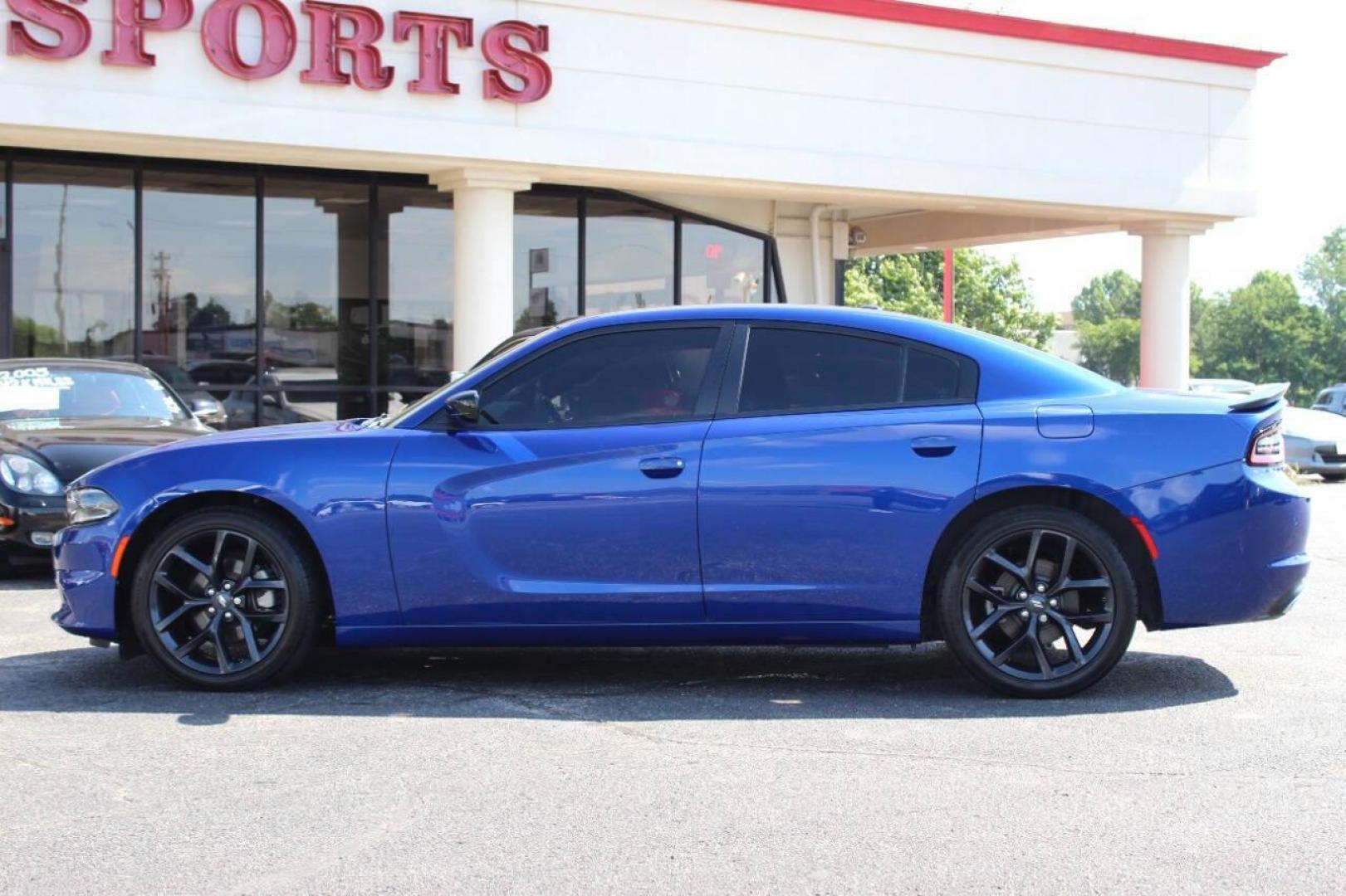 2022 Blue Dodge Charger SXT (2C3CDXBG8NH) with an 3.6L V6 DOHC 24V engine, 8A transmission, located at 4301 NW 39th , Oklahoma City, OK, 73112, (405) 949-5600, 35.512135, -97.598671 - NO DRIVERS LICENCE -NO FULL COVERAGE INSURANCE - NO CREDIT CHECK. COME ON OVER TO SUPERSPORTS, TAKE A LOOK AND TEST DRIVE. PLEASE GIVE US A CALL AT (405) 949-5600. NO LICENCIA DE CONDUCIR - NO SEGURO DE COBERTURA TOTAL - NO VERIFICACION DE CREDITO. VISITENOS EN SUPERSPORTS, MIRE NUESTRO - Photo#6