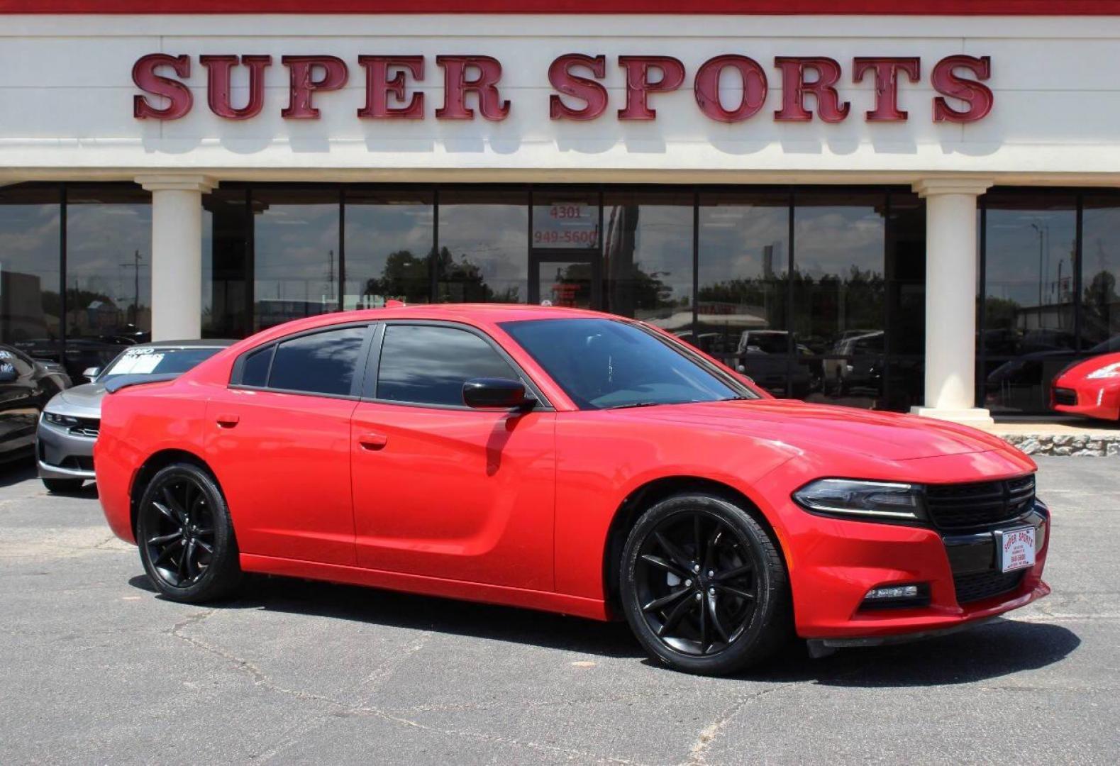 2016 Red Dodge Charger SXT (2C3CDXHGXGH) with an 3.6L V6 DOHC 24V engine, 8A transmission, located at 4301 NW 39th , Oklahoma City, OK, 73112, (405) 949-5600, 35.512135, -97.598671 - NO DRIVERS LICENCE -NO FULL COVERAGE INSURANCE - NO CREDIT CHECK. COME ON OVER TO SUPERSPORTS, TAKE A LOOK AND TEST DRIVE. PLEASE GIVE US A CALL AT (405) 949-5600. NO LICENCIA DE CONDUCIR - NO SEGURO DE COBERTURA TOTAL - NO VERIFICACION DE CREDITO. VISITENOS EN SUPERSPORTS, MIRE NUESTRO - Photo#2