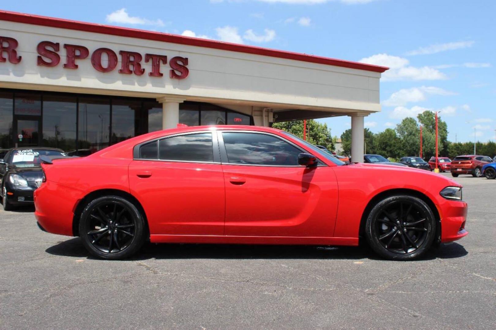 2016 Red Dodge Charger SXT (2C3CDXHGXGH) with an 3.6L V6 DOHC 24V engine, 8A transmission, located at 4301 NW 39th , Oklahoma City, OK, 73112, (405) 949-5600, 35.512135, -97.598671 - NO DRIVERS LICENCE -NO FULL COVERAGE INSURANCE - NO CREDIT CHECK. COME ON OVER TO SUPERSPORTS, TAKE A LOOK AND TEST DRIVE. PLEASE GIVE US A CALL AT (405) 949-5600. NO LICENCIA DE CONDUCIR - NO SEGURO DE COBERTURA TOTAL - NO VERIFICACION DE CREDITO. VISITENOS EN SUPERSPORTS, MIRE NUESTRO - Photo#3