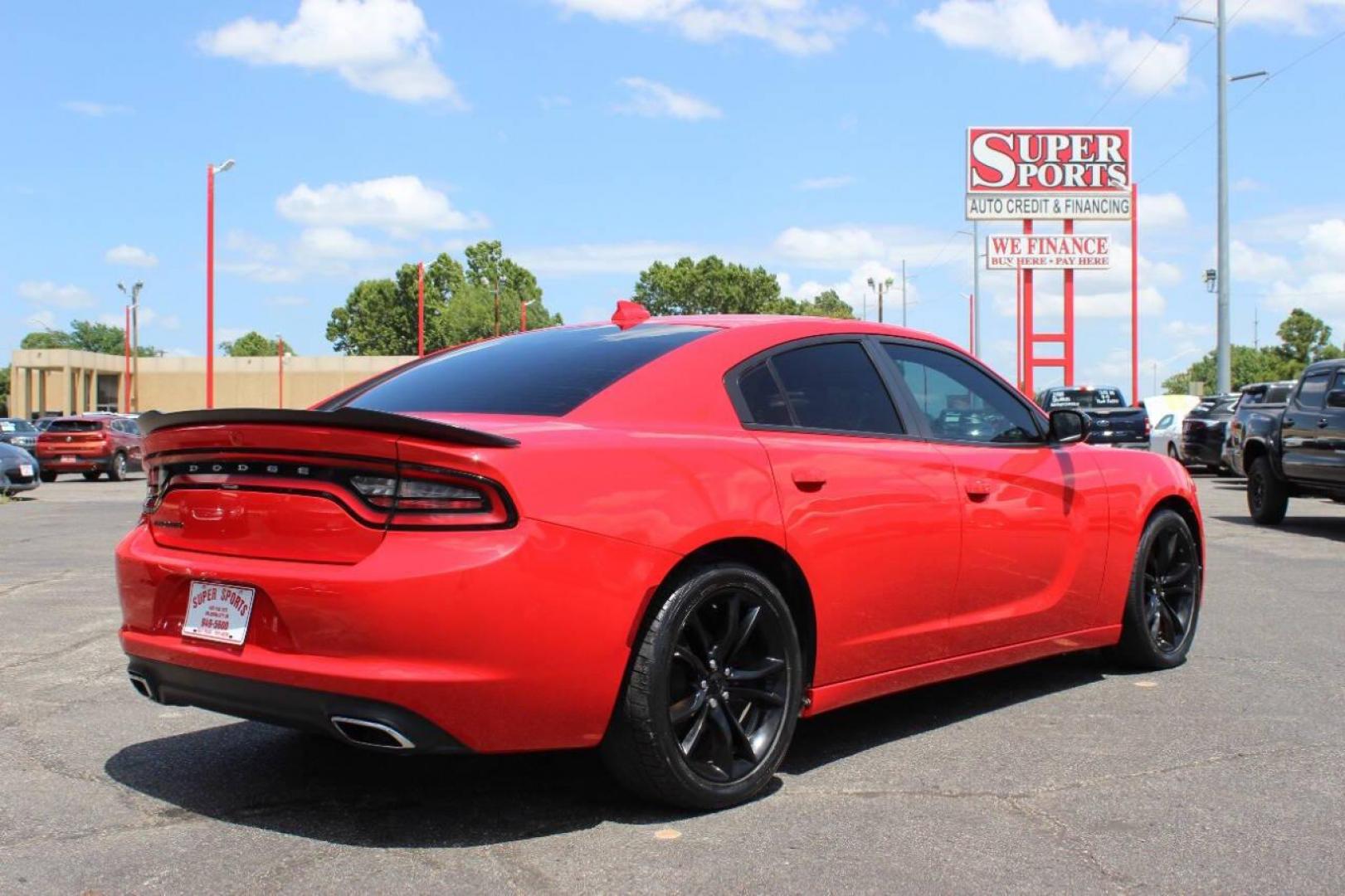 2016 Red Dodge Charger SXT (2C3CDXHGXGH) with an 3.6L V6 DOHC 24V engine, 8A transmission, located at 4301 NW 39th , Oklahoma City, OK, 73112, (405) 949-5600, 35.512135, -97.598671 - NO DRIVERS LICENCE -NO FULL COVERAGE INSURANCE - NO CREDIT CHECK. COME ON OVER TO SUPERSPORTS, TAKE A LOOK AND TEST DRIVE. PLEASE GIVE US A CALL AT (405) 949-5600. NO LICENCIA DE CONDUCIR - NO SEGURO DE COBERTURA TOTAL - NO VERIFICACION DE CREDITO. VISITENOS EN SUPERSPORTS, MIRE NUESTRO - Photo#4