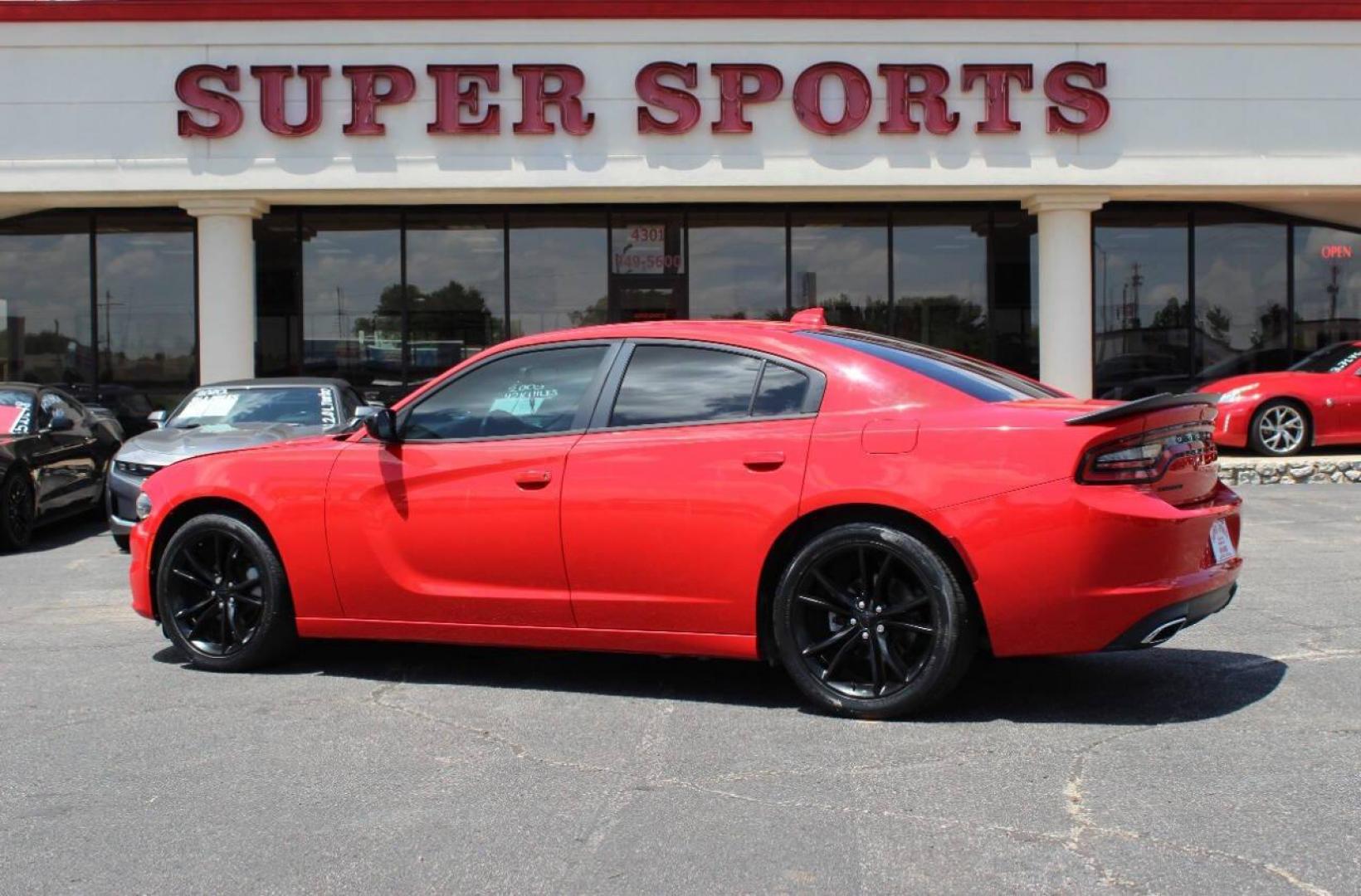 2016 Red Dodge Charger SXT (2C3CDXHGXGH) with an 3.6L V6 DOHC 24V engine, 8A transmission, located at 4301 NW 39th , Oklahoma City, OK, 73112, (405) 949-5600, 35.512135, -97.598671 - NO DRIVERS LICENCE -NO FULL COVERAGE INSURANCE - NO CREDIT CHECK. COME ON OVER TO SUPERSPORTS, TAKE A LOOK AND TEST DRIVE. PLEASE GIVE US A CALL AT (405) 949-5600. NO LICENCIA DE CONDUCIR - NO SEGURO DE COBERTURA TOTAL - NO VERIFICACION DE CREDITO. VISITENOS EN SUPERSPORTS, MIRE NUESTRO - Photo#5