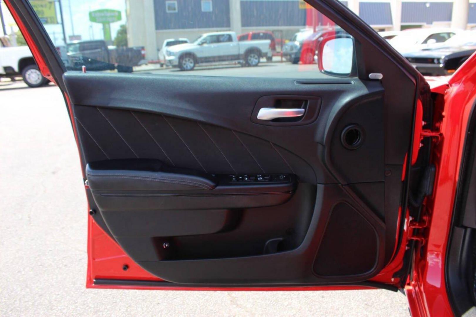 2016 Red Dodge Charger SXT (2C3CDXHGXGH) with an 3.6L V6 DOHC 24V engine, 8A transmission, located at 4301 NW 39th , Oklahoma City, OK, 73112, (405) 949-5600, 35.512135, -97.598671 - NO DRIVERS LICENCE -NO FULL COVERAGE INSURANCE - NO CREDIT CHECK. COME ON OVER TO SUPERSPORTS, TAKE A LOOK AND TEST DRIVE. PLEASE GIVE US A CALL AT (405) 949-5600. NO LICENCIA DE CONDUCIR - NO SEGURO DE COBERTURA TOTAL - NO VERIFICACION DE CREDITO. VISITENOS EN SUPERSPORTS, MIRE NUESTRO - Photo#17