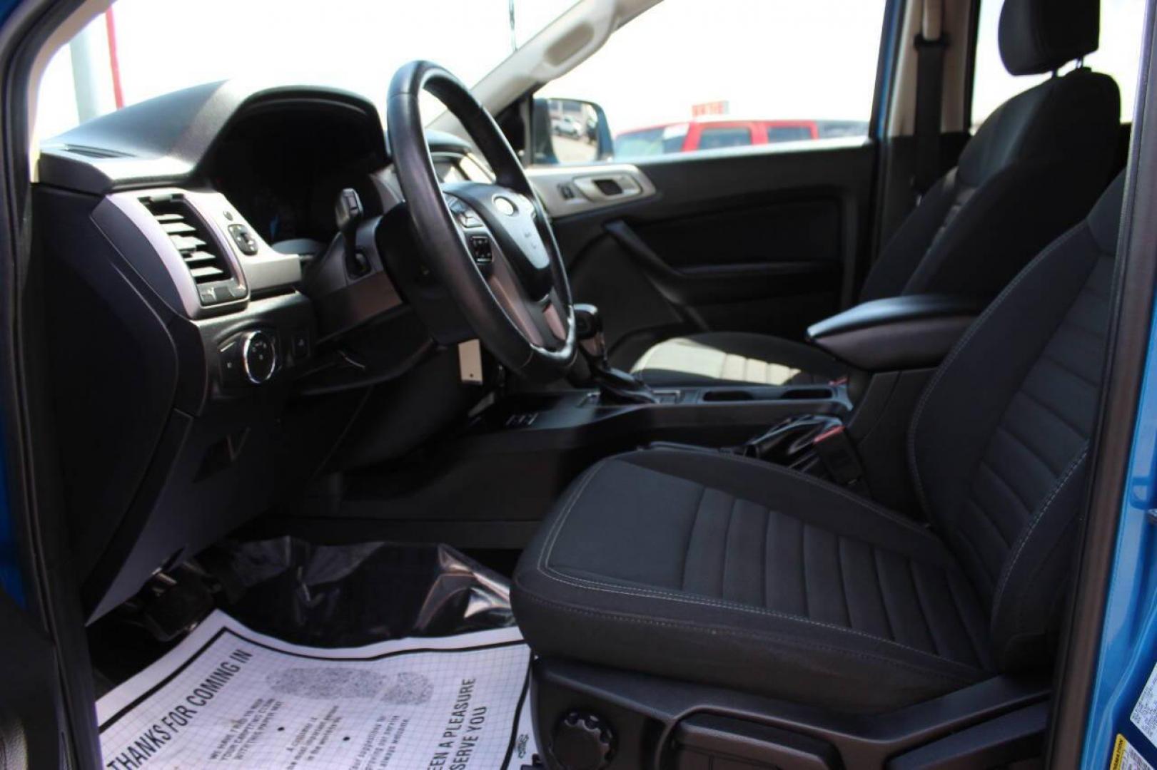 2021 Blue Ford Ranger XL SuperCrew 2WD (1FTER4EH9ML) with an 2.3L L4 DOHC 16V engine, 10A transmission, located at 4301 NW 39th , Oklahoma City, OK, 73112, (405) 949-5600, 35.512135, -97.598671 - NO DRIVERS LICENCE -NO FULL COVERAGE INSURANCE - NO CREDIT CHECK. COME ON OVER TO SUPERSPORTS, TAKE A LOOK AND TEST DRIVE. PLEASE GIVE US A CALL AT (405) 949-5600. NO LICENCIA DE CONDUCIR - NO SEGURO DE COBERTURA TOTAL - NO VERIFICACION DE CREDITO. VISITENOS EN SUPERSPORTS, MIRE NUESTRO - Photo#15