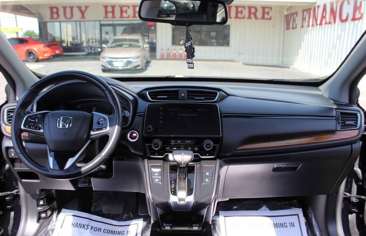 2022 Black Honda CR-V EX-L 2WD (2HKRW1H83NH) with an 1.5L L4 16V DOHC TURBO engine, CVT transmission, located at 4301 NW 39th , Oklahoma City, OK, 73112, (405) 949-5600, 35.512135, -97.598671 - NO DRIVERS LICENCE -NO FULL COVERAGE INSURANCE - NO CREDIT CHECK. COME ON OVER TO SUPERSPORTS, TAKE A LOOK AND TEST DRIVE. PLEASE GIVE US A CALL AT (405) 949-5600. NO LICENCIA DE CONDUCIR - NO SEGURO DE COBERTURA TOTAL - NO VERIFICACION DE CREDITO. VISITENOS EN SUPERSPORTS, MIRE NUESTRO - Photo#17