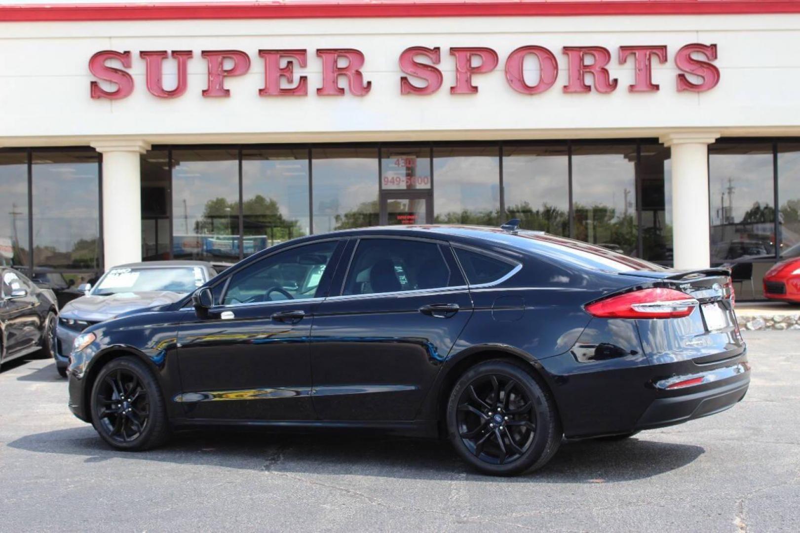 2019 Black Ford Fusion SE (3FA6P0HD6KR) with an 1.5L L4 DOHC 16V engine, 6A transmission, located at 4301 NW 39th , Oklahoma City, OK, 73112, (405) 949-5600, 35.512135, -97.598671 - NO DRIVERS LICENCE -NO FULL COVERAGE INSURANCE - NO CREDIT CHECK. COME ON OVER TO SUPERSPORTS, TAKE A LOOK AND TEST DRIVE. PLEASE GIVE US A CALL AT (405) 949-5600. NO LICENCIA DE CONDUCIR - NO SEGURO DE COBERTURA TOTAL - NO VERIFICACION DE CREDITO. VISITENOS EN SUPERSPORTS, MIRE NUESTRO - Photo#5