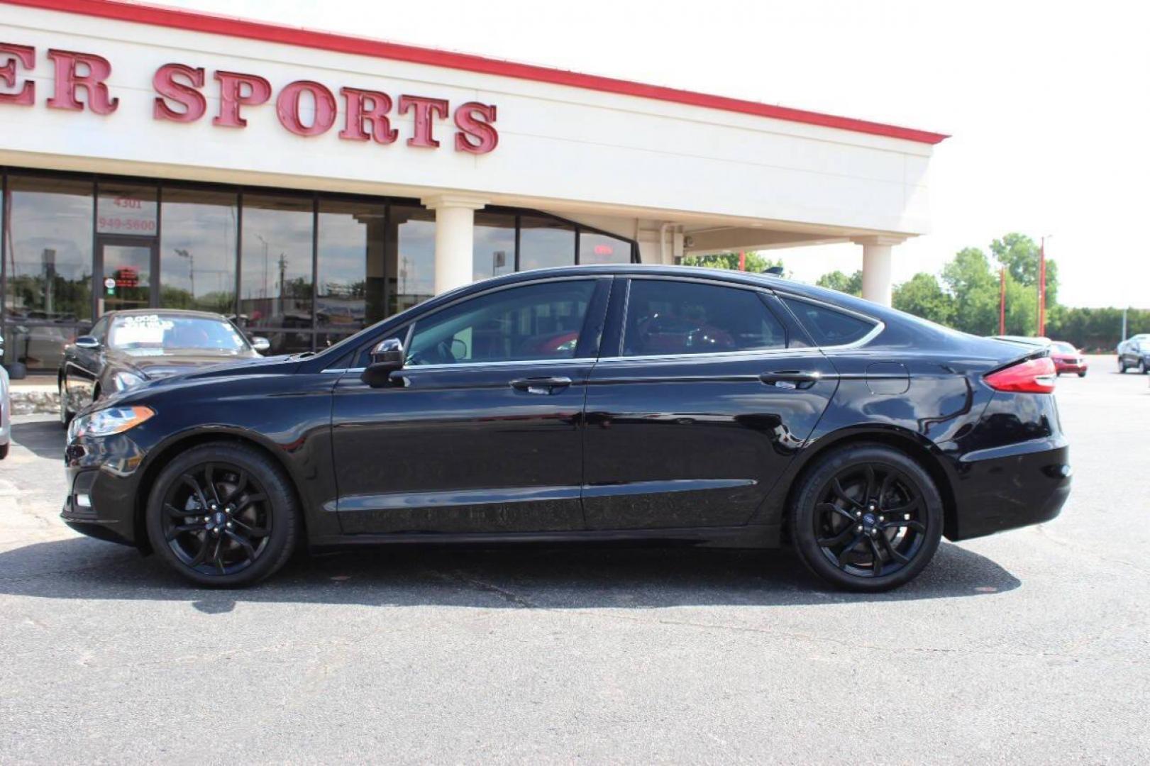 2019 Black Ford Fusion SE (3FA6P0HD6KR) with an 1.5L L4 DOHC 16V engine, 6A transmission, located at 4301 NW 39th , Oklahoma City, OK, 73112, (405) 949-5600, 35.512135, -97.598671 - NO DRIVERS LICENCE -NO FULL COVERAGE INSURANCE - NO CREDIT CHECK. COME ON OVER TO SUPERSPORTS, TAKE A LOOK AND TEST DRIVE. PLEASE GIVE US A CALL AT (405) 949-5600. NO LICENCIA DE CONDUCIR - NO SEGURO DE COBERTURA TOTAL - NO VERIFICACION DE CREDITO. VISITENOS EN SUPERSPORTS, MIRE NUESTRO - Photo#6