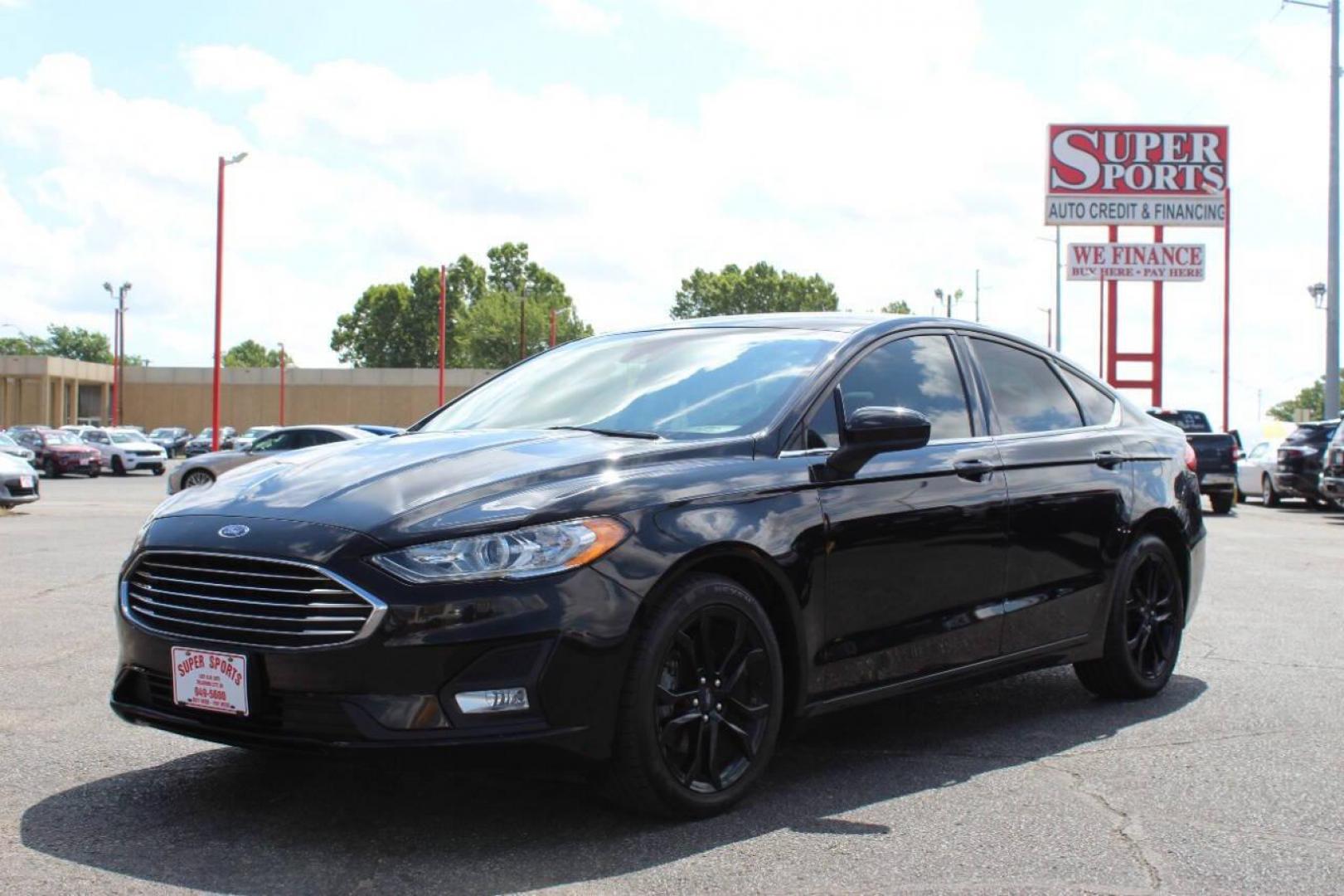 2019 Black Ford Fusion SE (3FA6P0HD6KR) with an 1.5L L4 DOHC 16V engine, 6A transmission, located at 4301 NW 39th , Oklahoma City, OK, 73112, (405) 949-5600, 35.512135, -97.598671 - NO DRIVERS LICENCE -NO FULL COVERAGE INSURANCE - NO CREDIT CHECK. COME ON OVER TO SUPERSPORTS, TAKE A LOOK AND TEST DRIVE. PLEASE GIVE US A CALL AT (405) 949-5600. NO LICENCIA DE CONDUCIR - NO SEGURO DE COBERTURA TOTAL - NO VERIFICACION DE CREDITO. VISITENOS EN SUPERSPORTS, MIRE NUESTRO - Photo#7